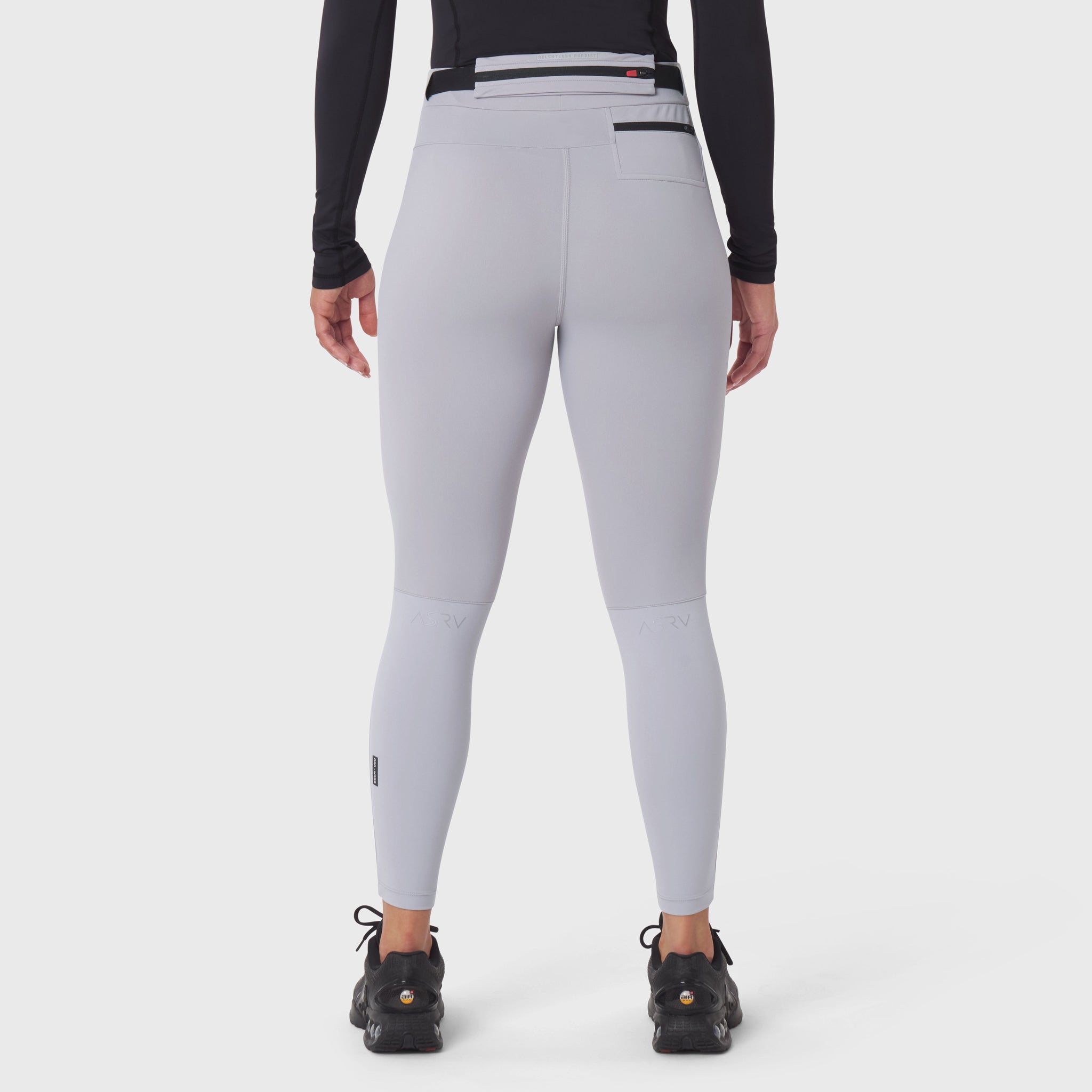 Hybrid Belt-Pack Run Legging in slate grey, rear view on model
