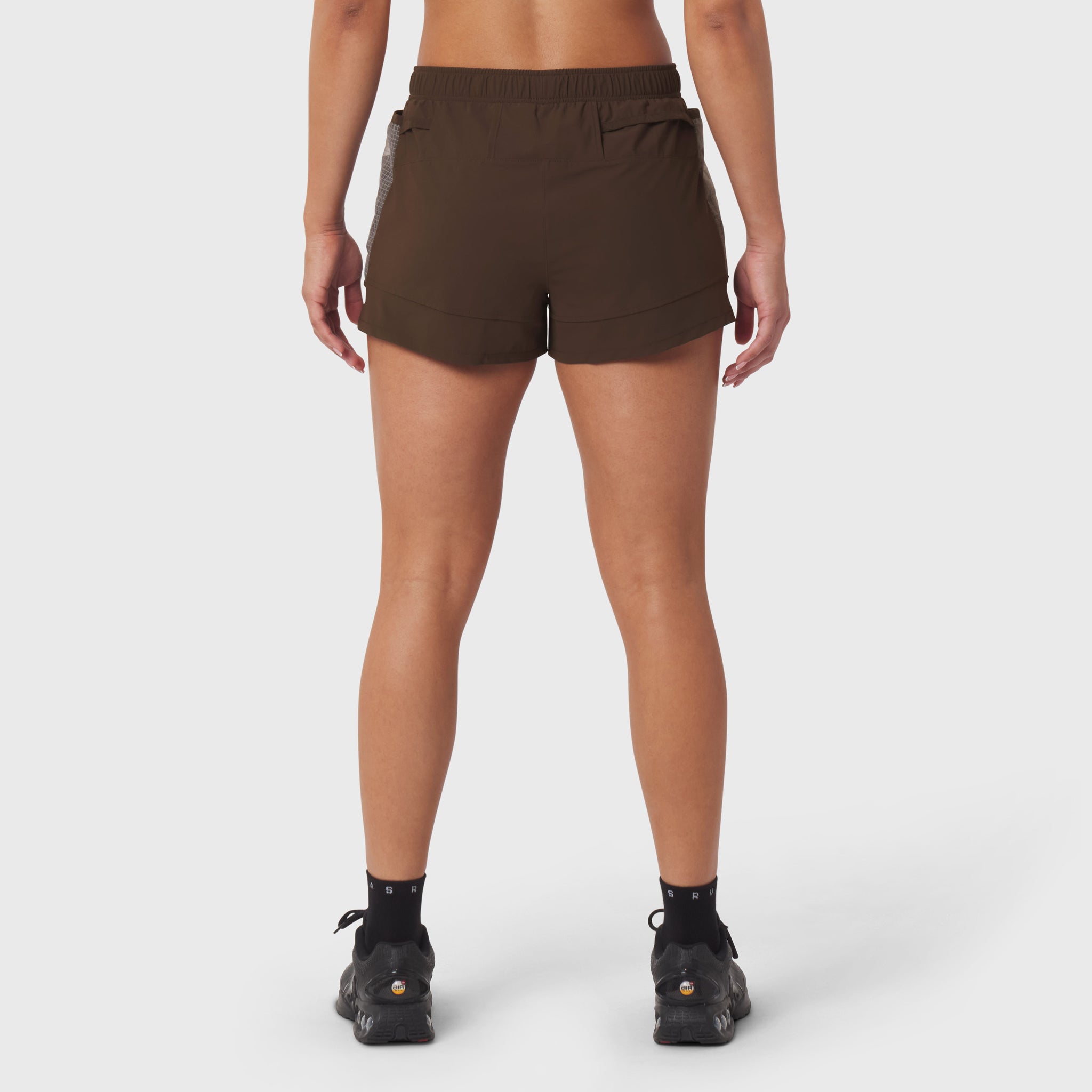 Tetra-Lite Adventure Short in Dark Earth, back view on model