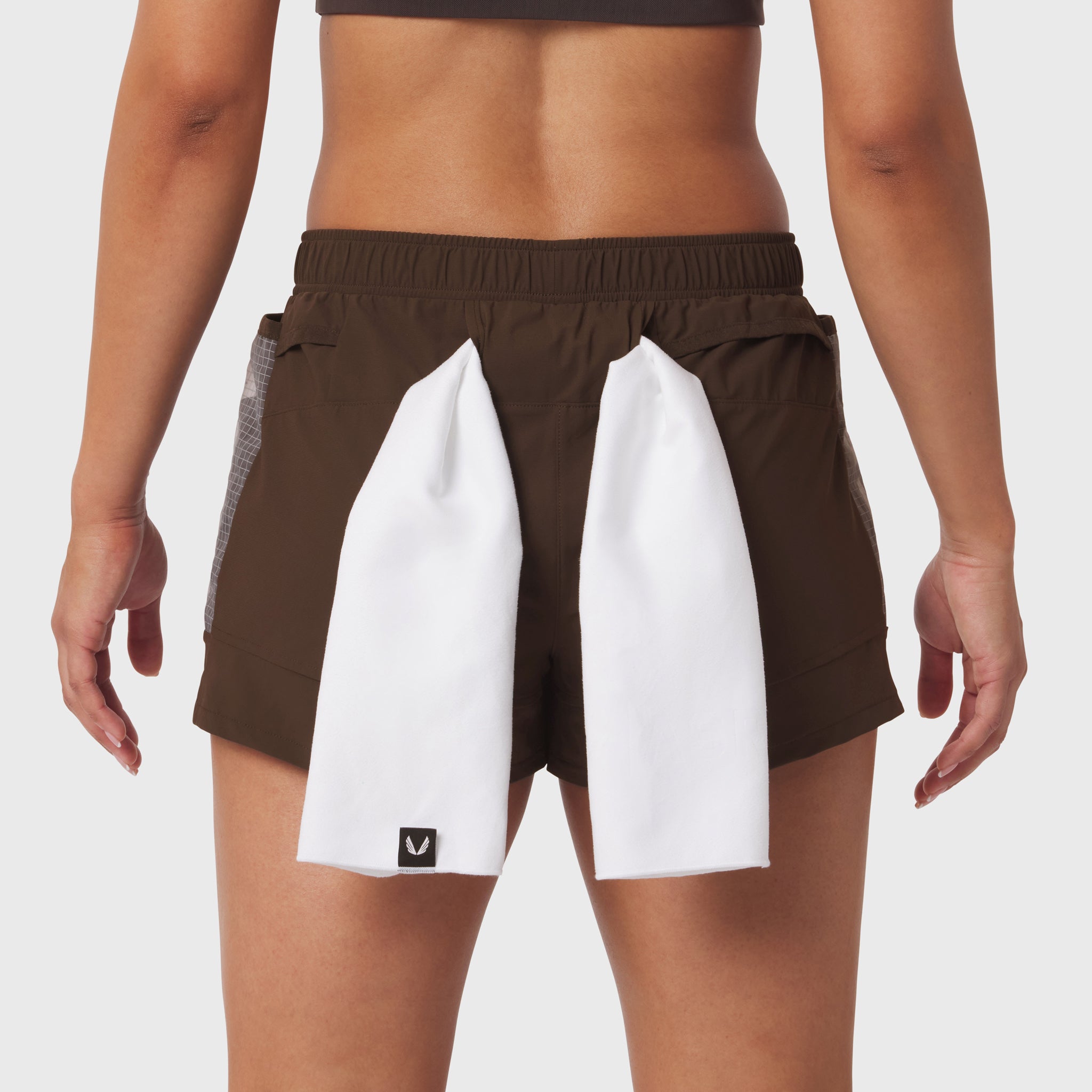 Tetra-Lite Adventure Short in Dark Earth with white panel detail, worn by model from waist down
