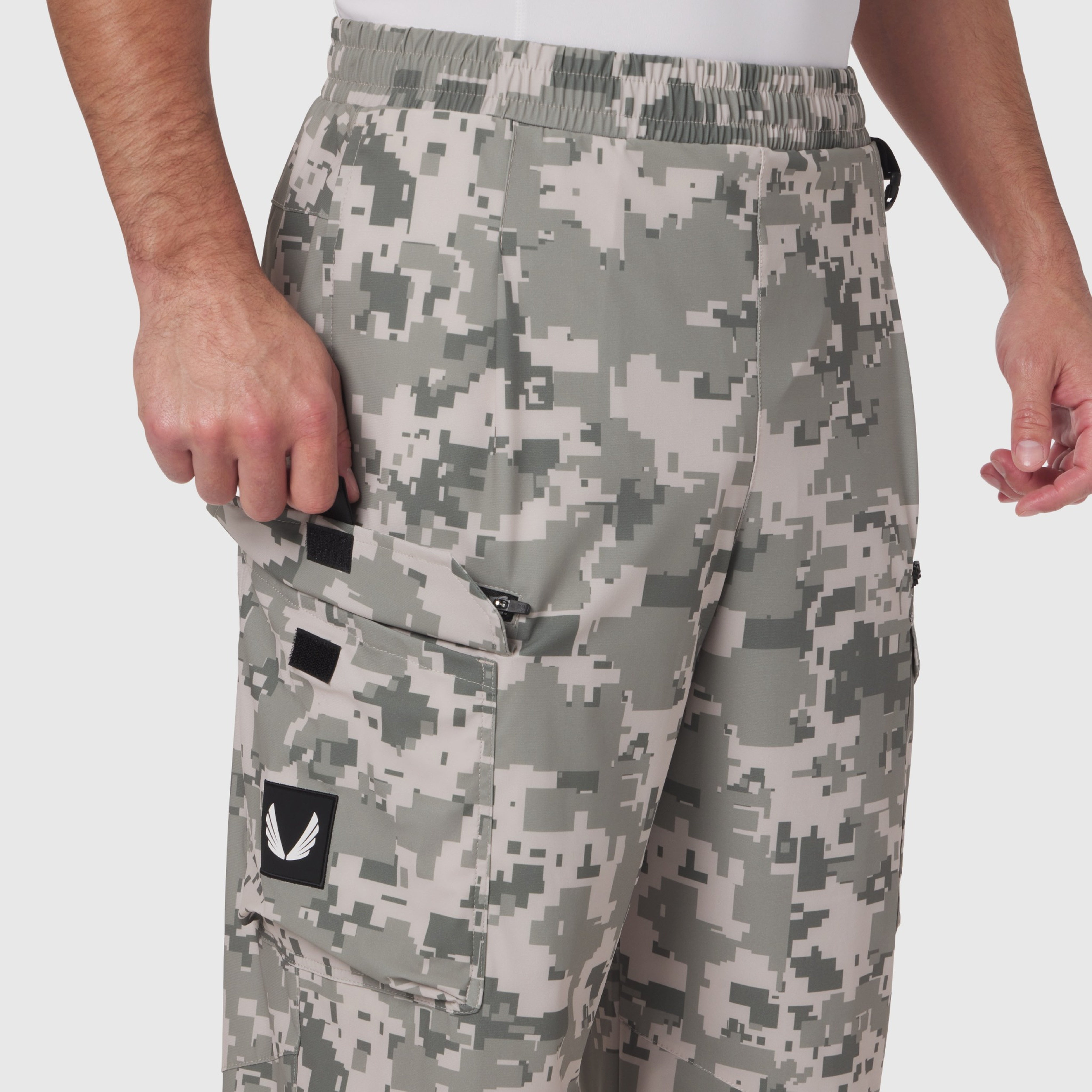Tetra-Lite Cargo City Pant in digital camo worn by model, side view showing cargo pockets