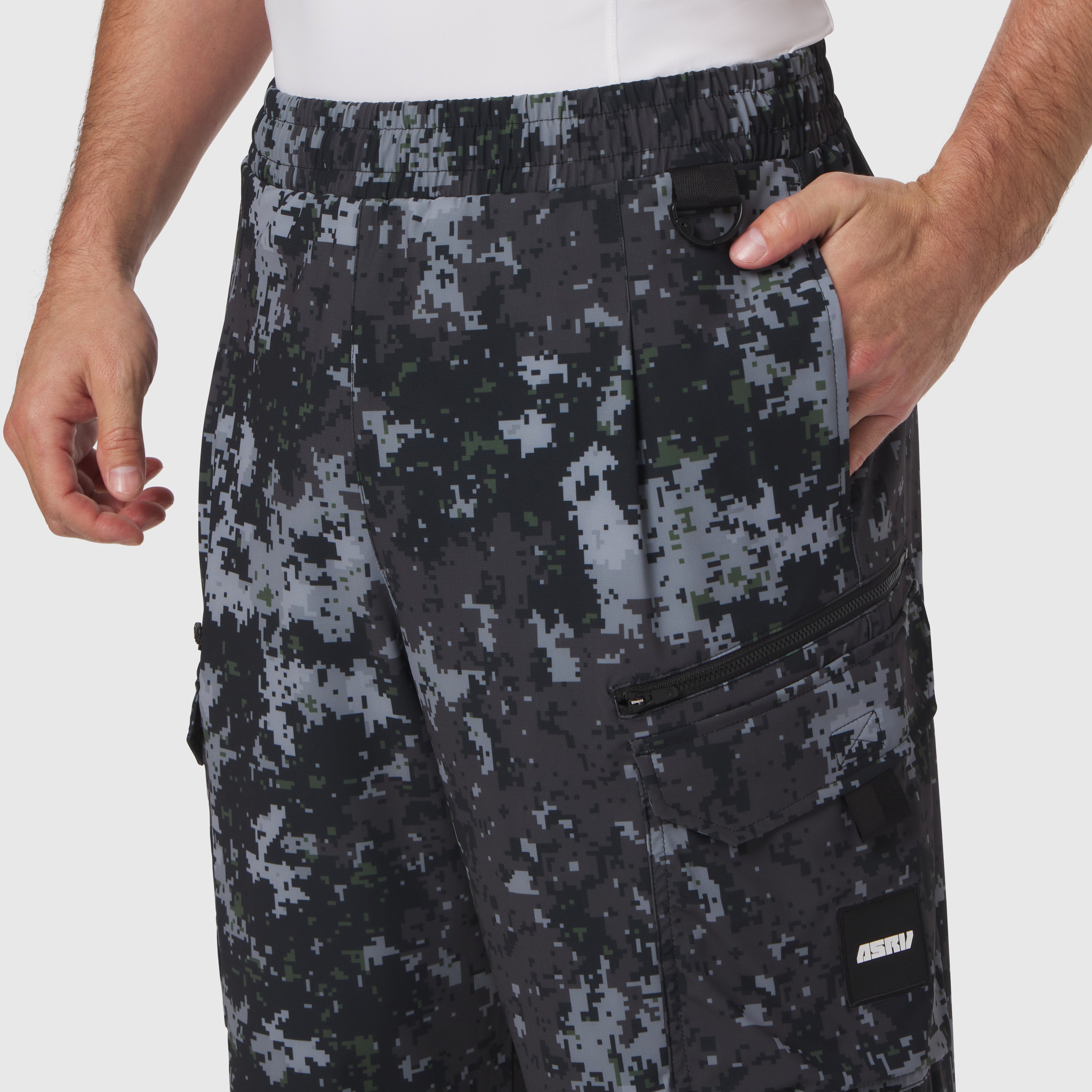 Tetra-Lite Cargo City Pant in pixel camo worn by model, front view with hand in pocket