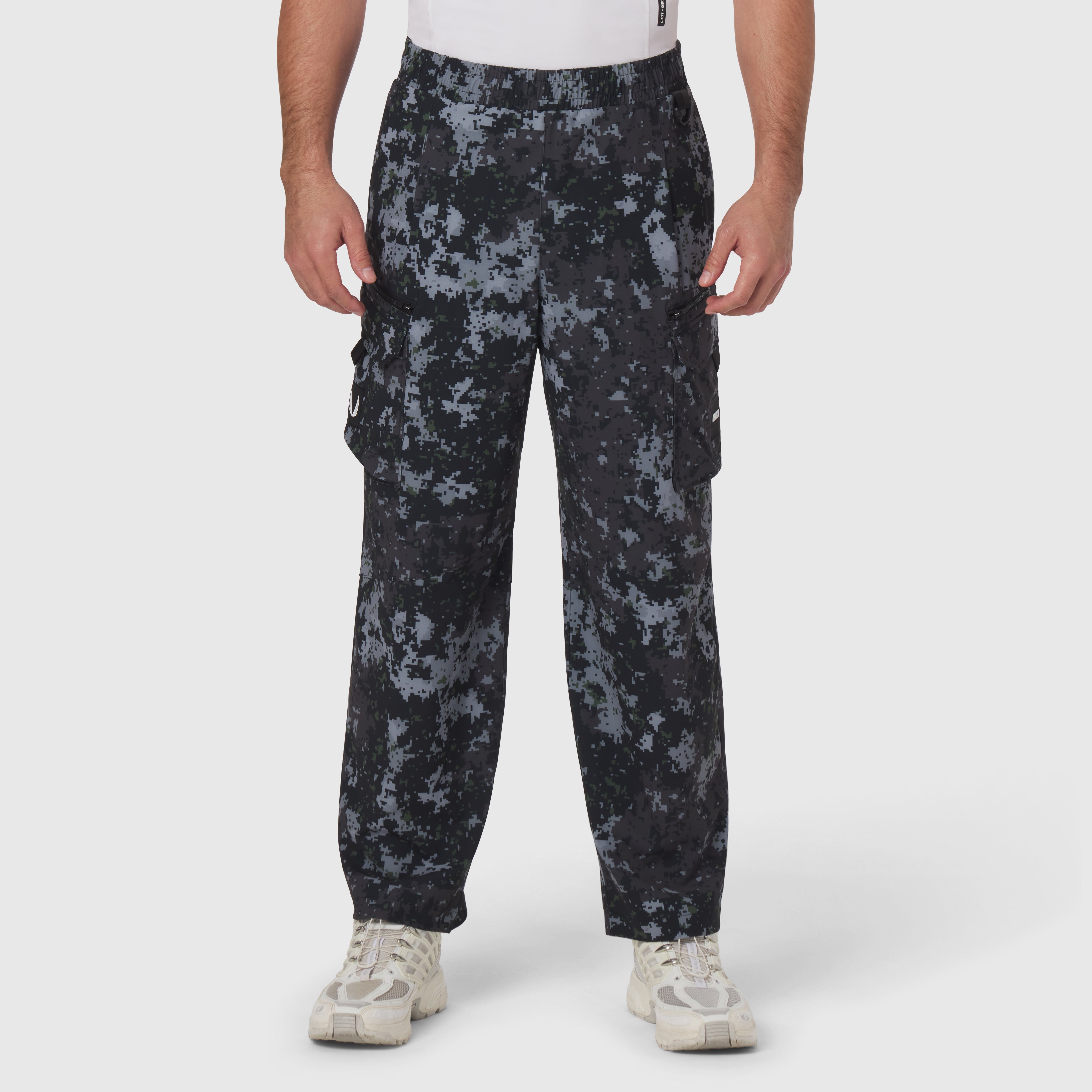 Tetra-Lite Cargo City Pant in pixel camo worn by model, front view