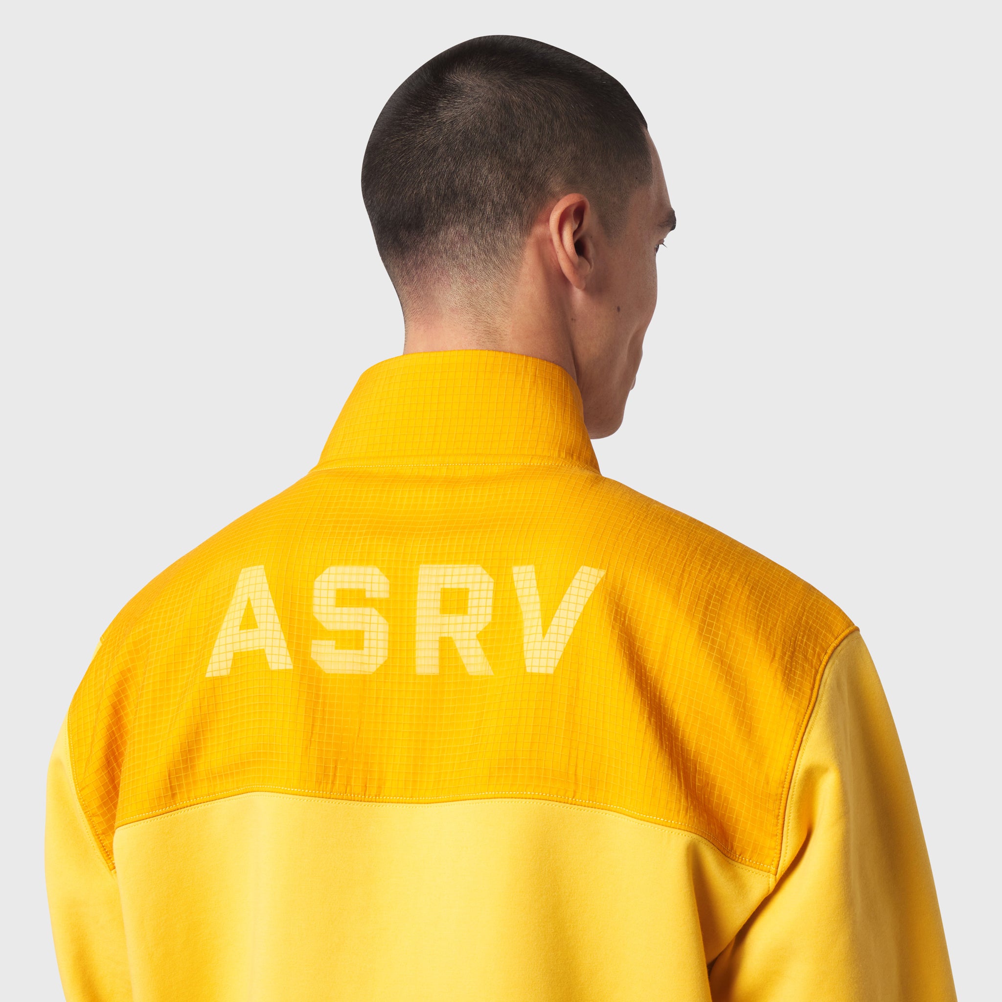 ASRV Dri-Core Sidelock Full Zip in amber yellow, back view on model