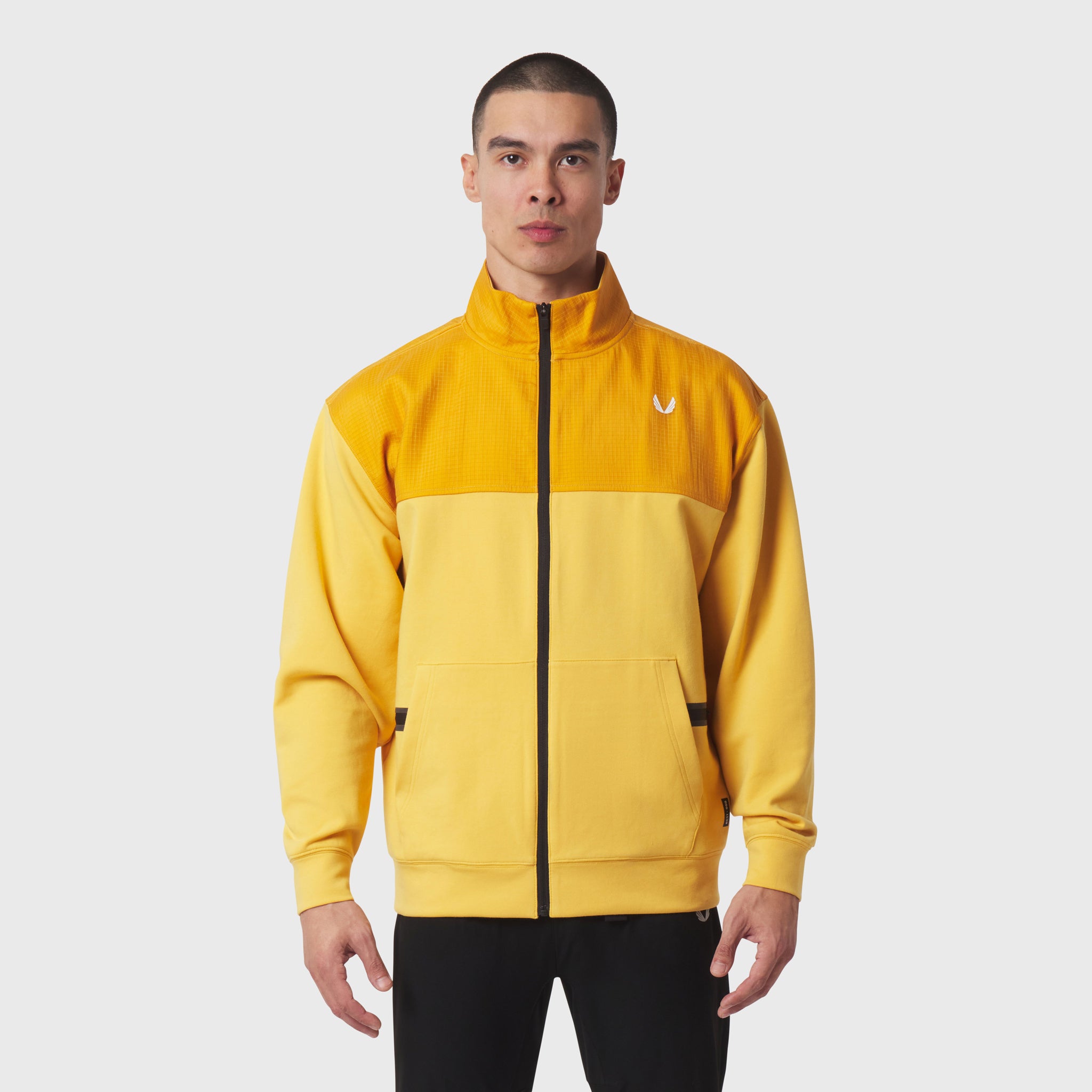 Dri-Core™ Sidelock Full Zip in amber yellow colorblock, worn by model, front view