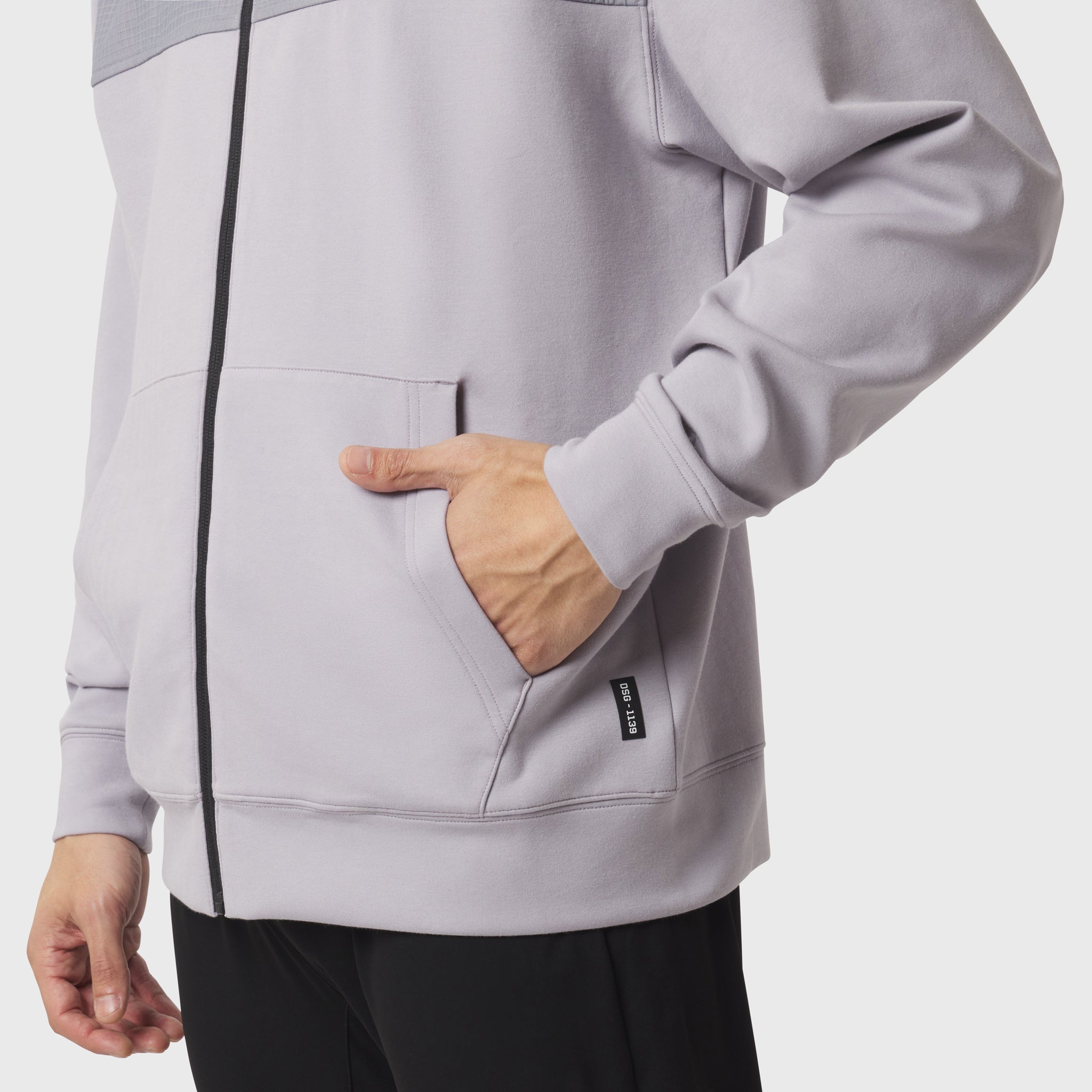 Dri-Core™ Sidelock Full Zip hoodie in slate grey, model wearing with hand in pocket