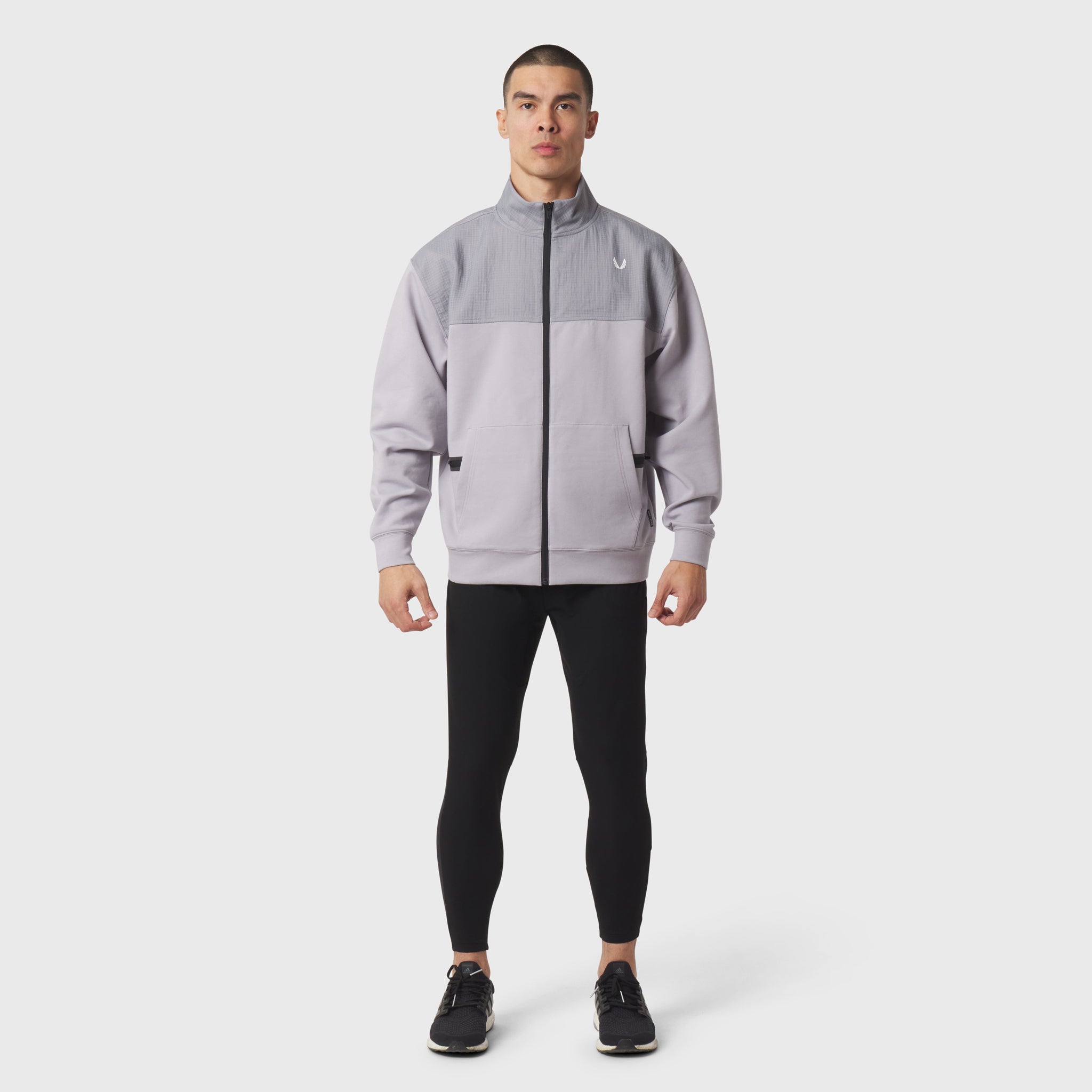 Dri-Core Sidelock Full Zip in slate grey, worn by model with black leggings, front view