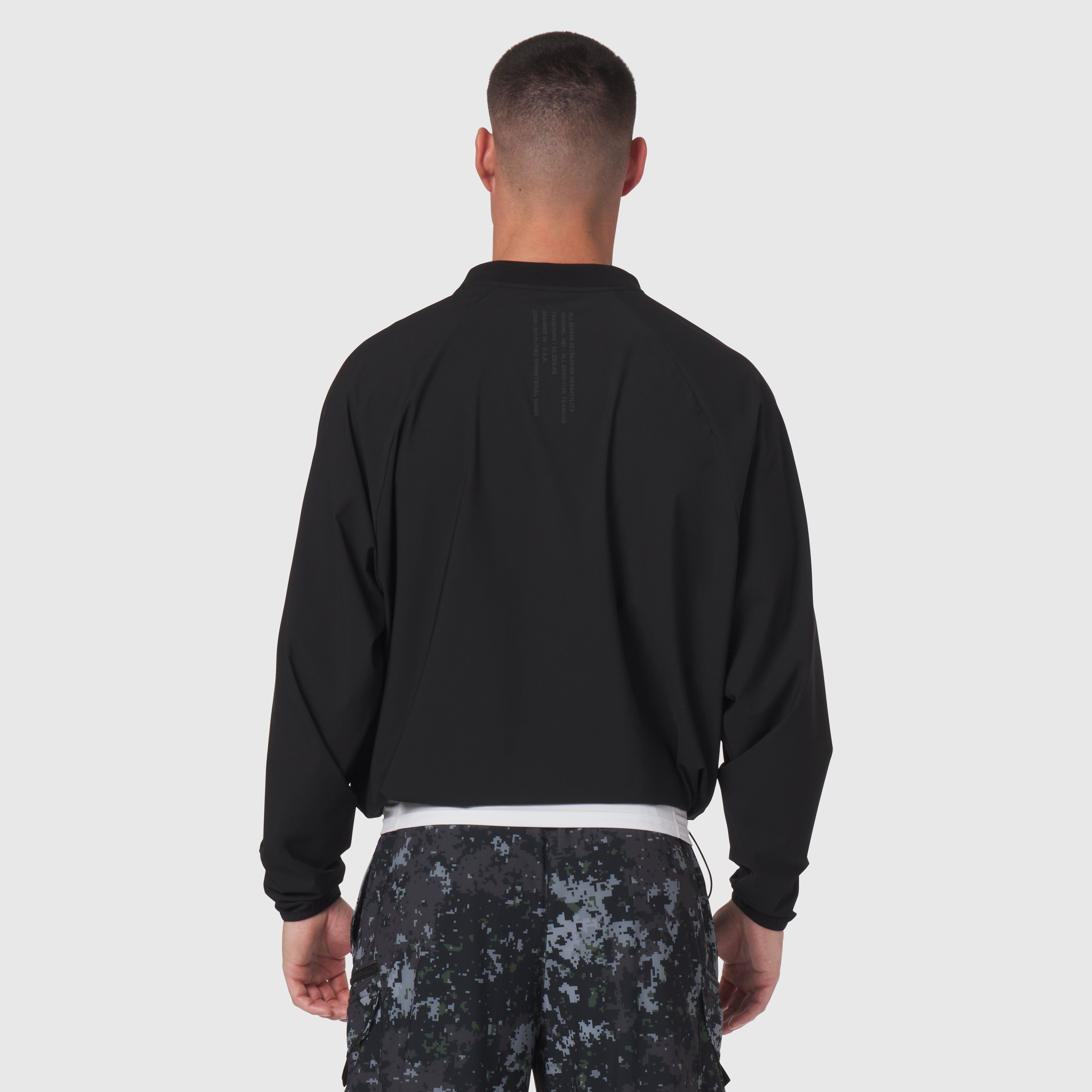 Tetra-Lite Blade Collar Zip Jacket in black, rear view on model