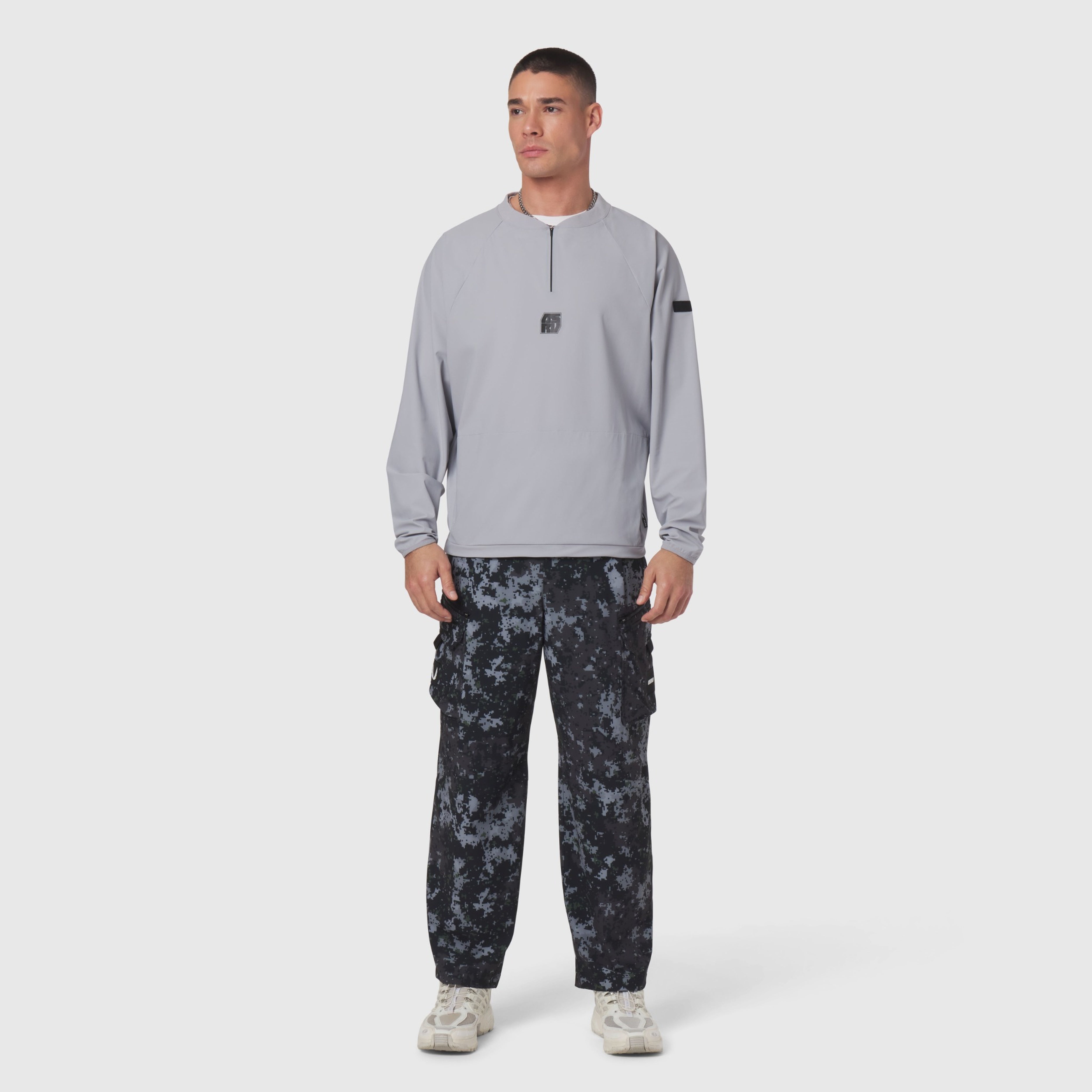 Tetra-Lite® Blade Collar Zip Jacket in slate grey worn with patterned cargo pants, front view