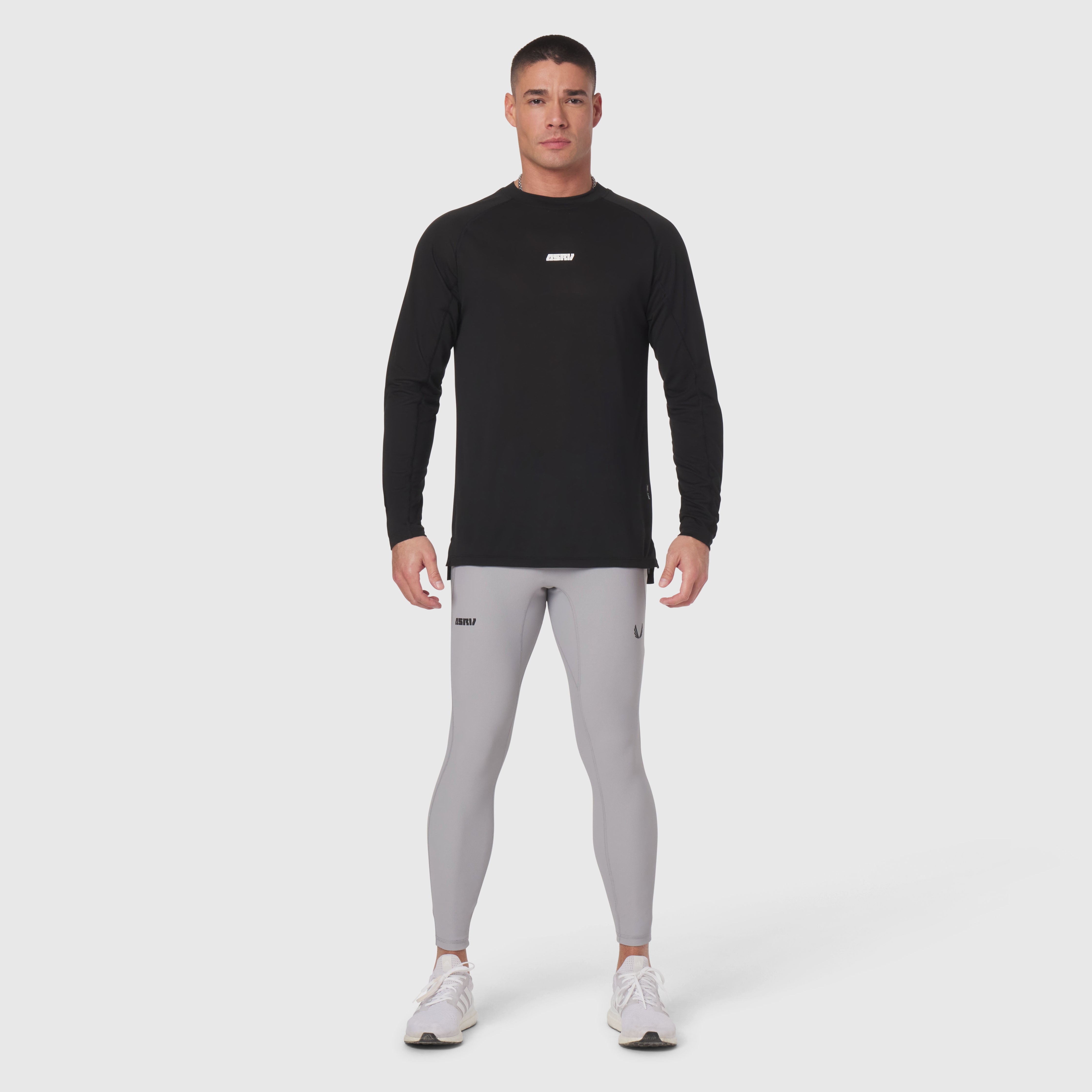 Polartec® Delta Longsleeve in black worn with grey leggings, front view