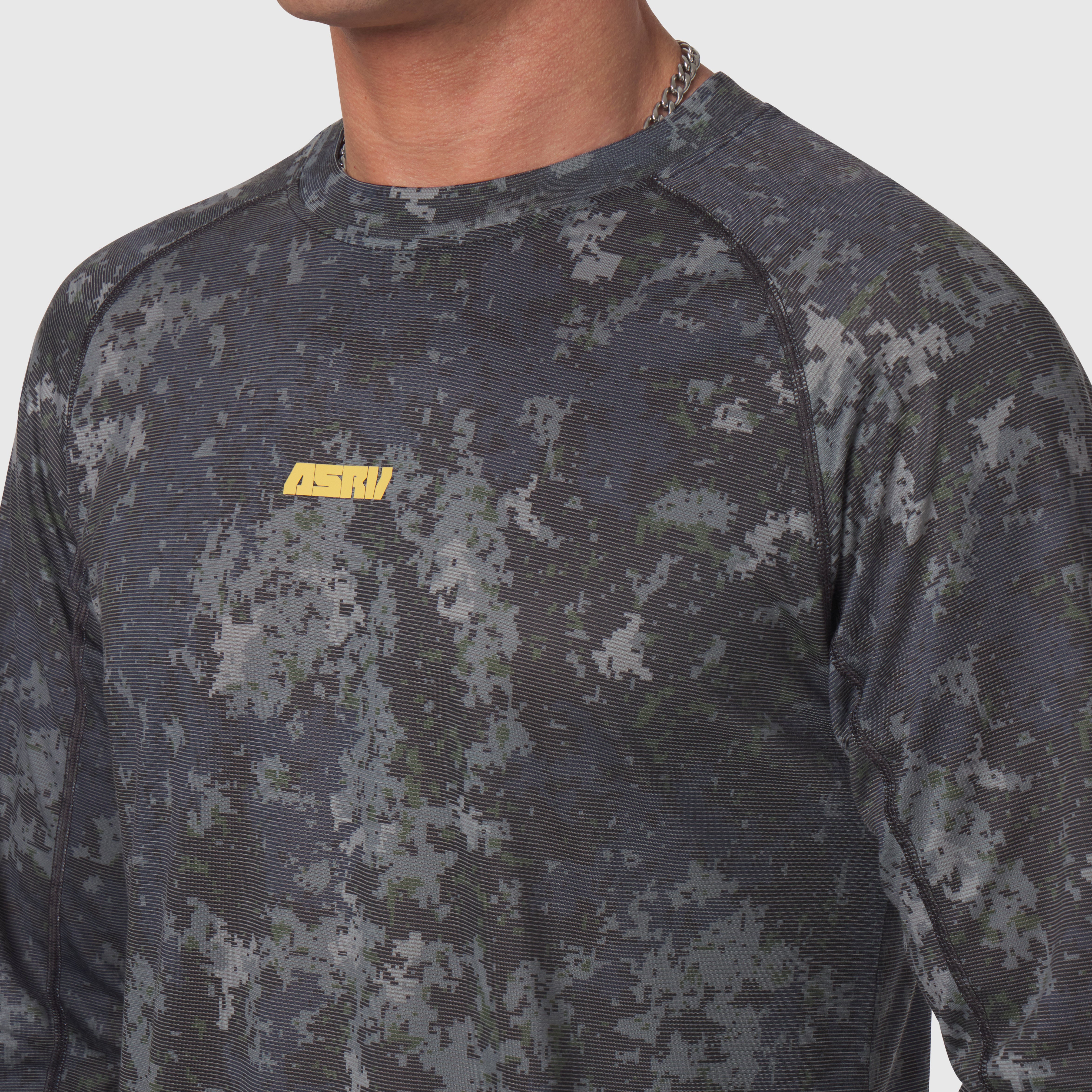 Polartec® Delta Longsleeve in pixel camo gray, worn by model, chest detail