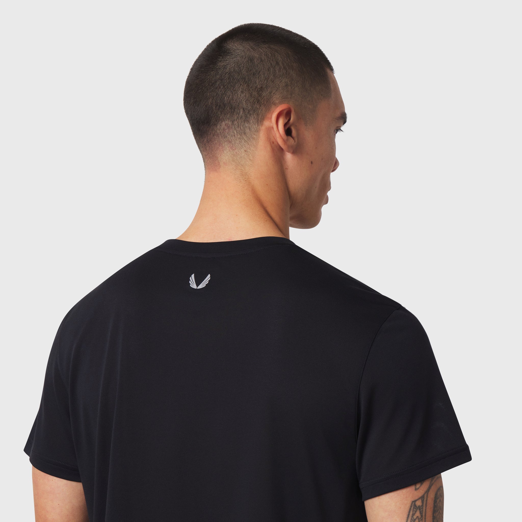 Polartec® Delta Training Tee in black, rear view on model