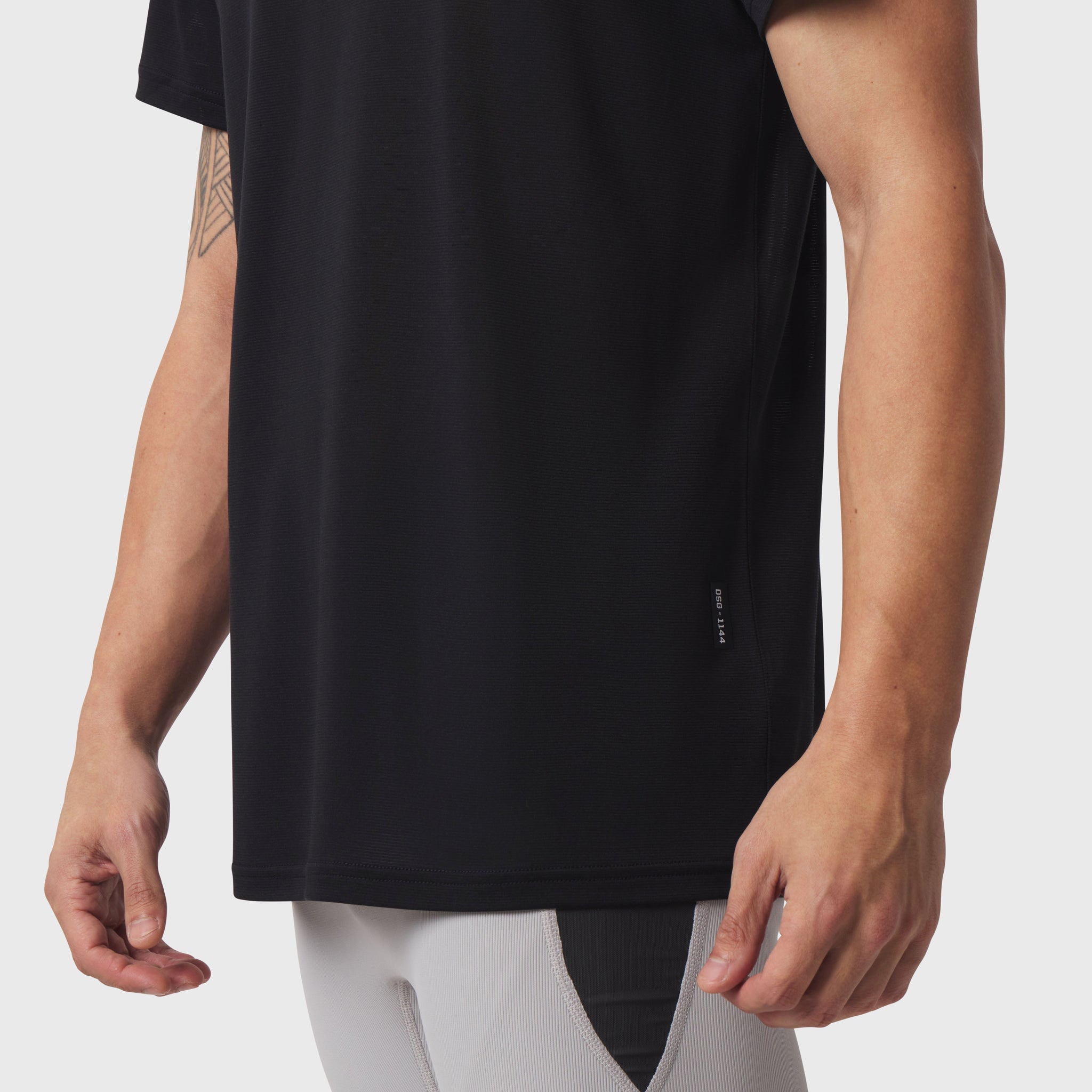 Black Polartec® Delta Training Tee worn by model, side view