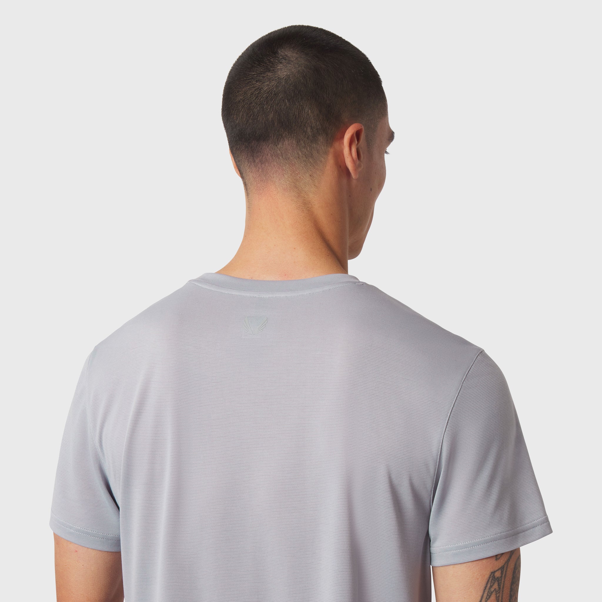Polartec® Delta Training Tee in slate grey, back view on model