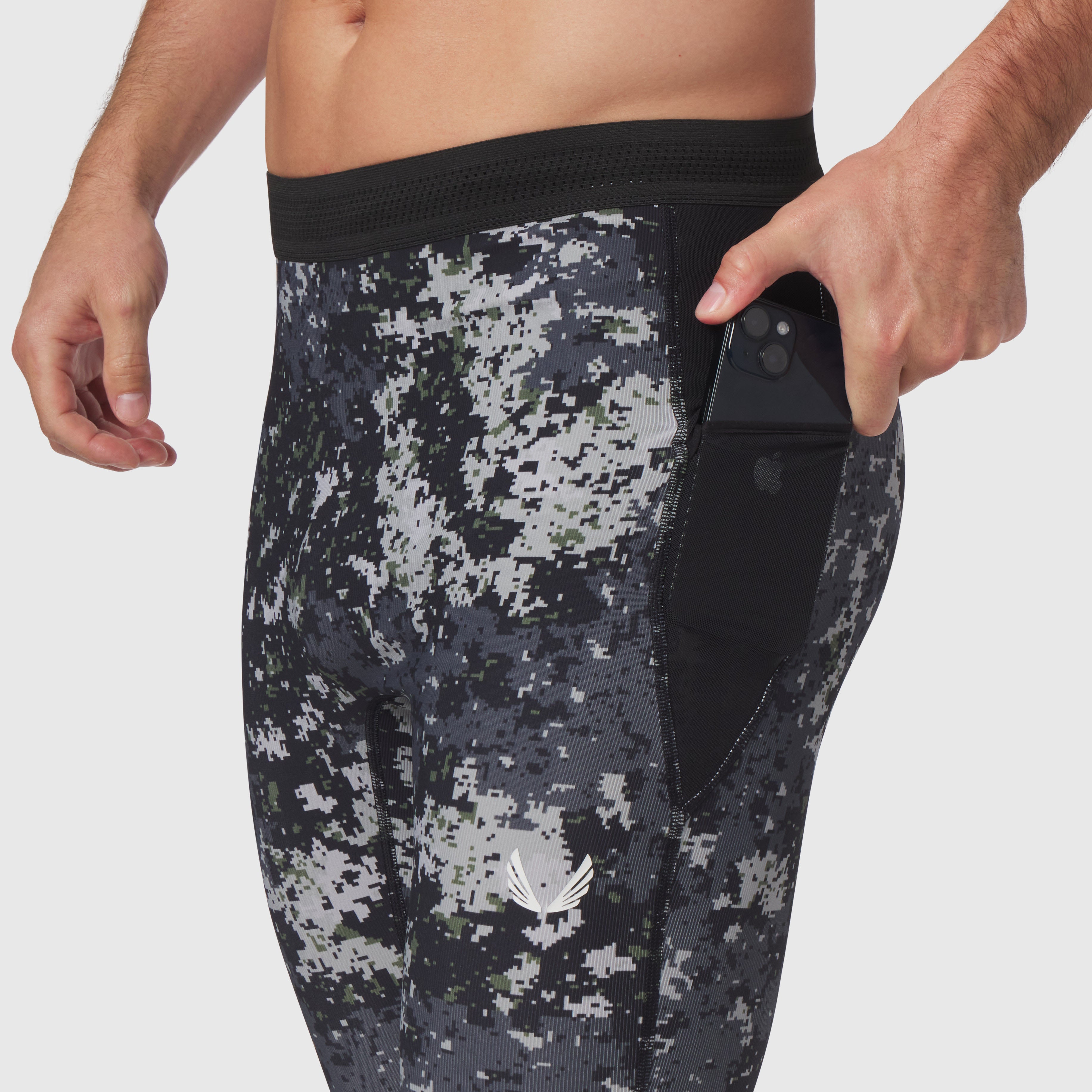 Lycra® Ribbed Running Tight in pixel camo worn by model, side view with phone pocket detail