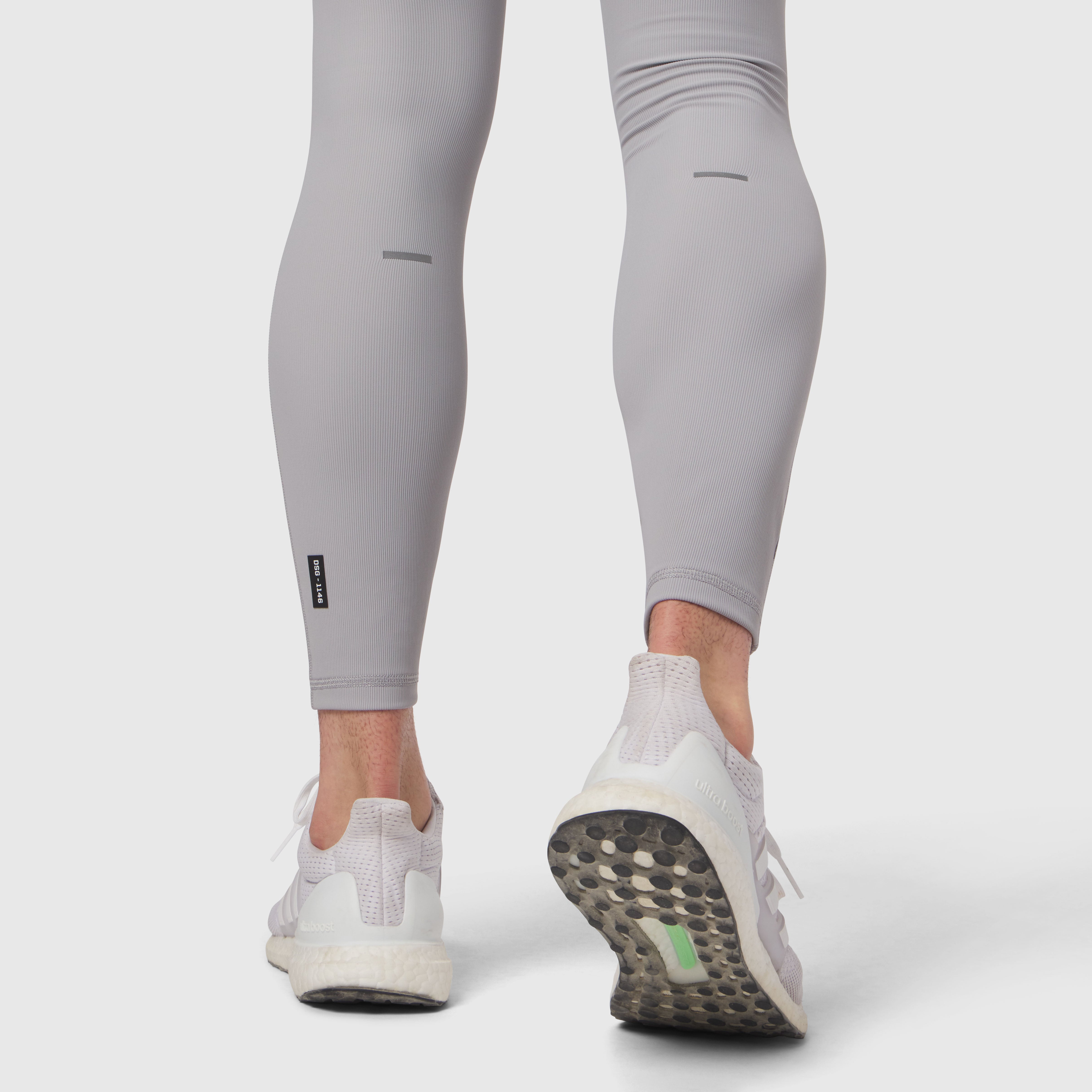 Lycra® Ribbed Running Tight in Slate Grey, worn by model showing back view and sole detail