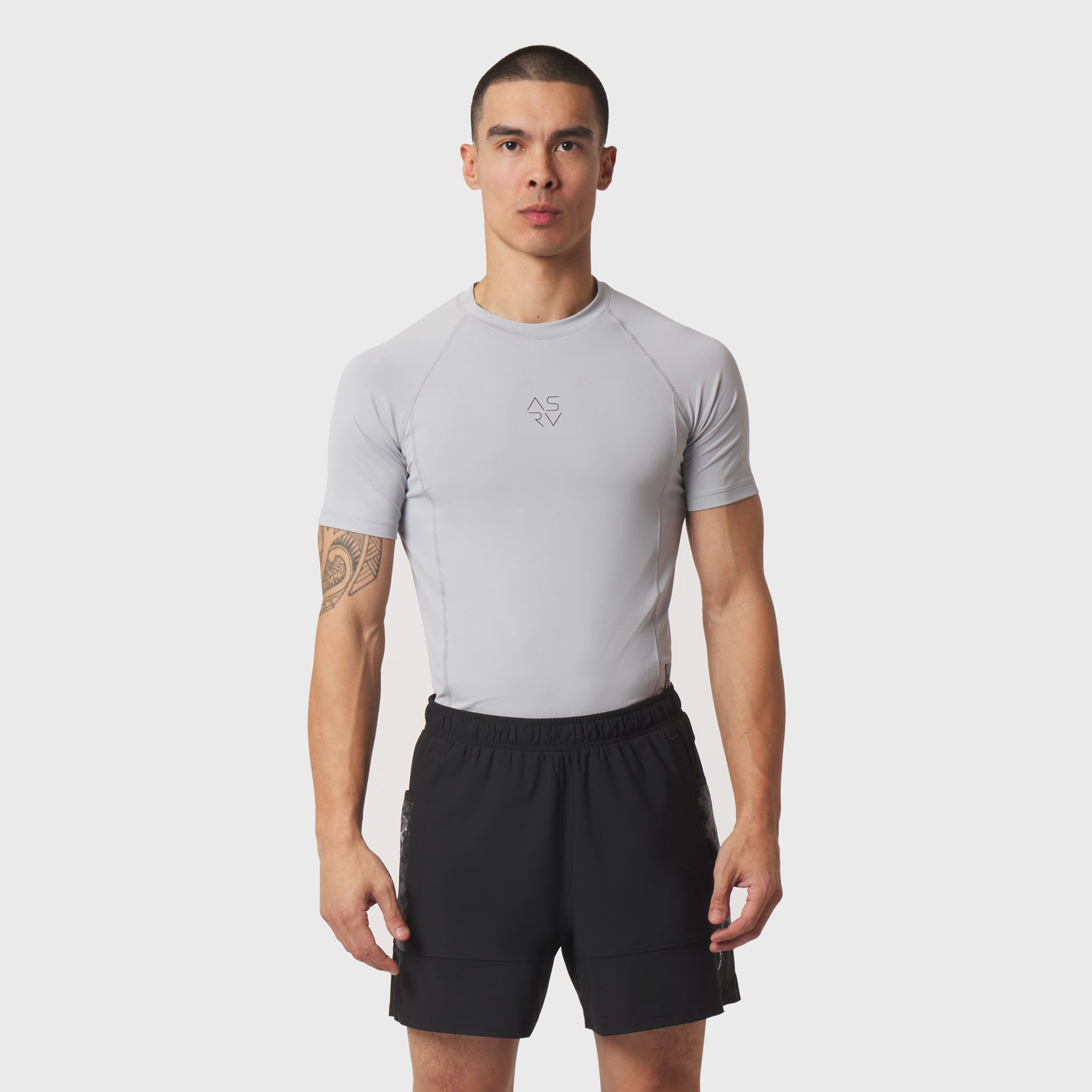 LYCRA® ADAPTIV baselayer shortsleeve in slate grey, worn by model, front view