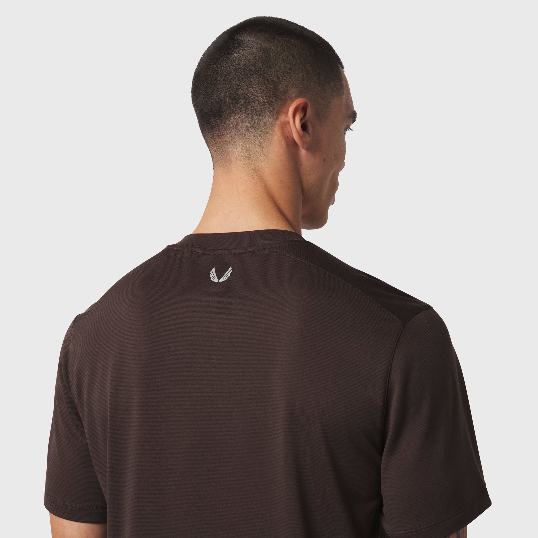 Polartec® Delta Polo in dark earth, rear view on model