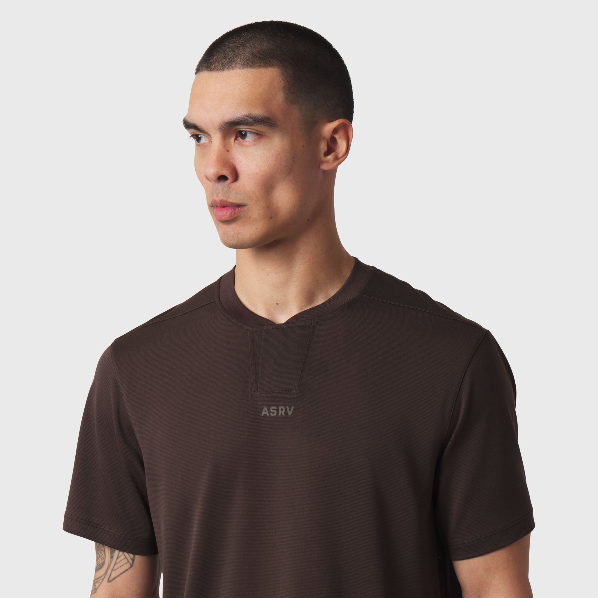 Polartec® Delta Polo in dark earth worn by model, front view