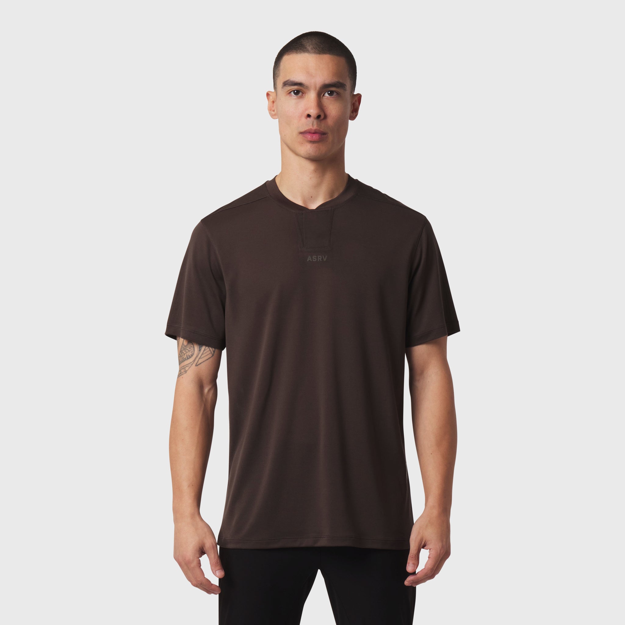 Dark Earth Polartec Delta polo worn by male model, front view