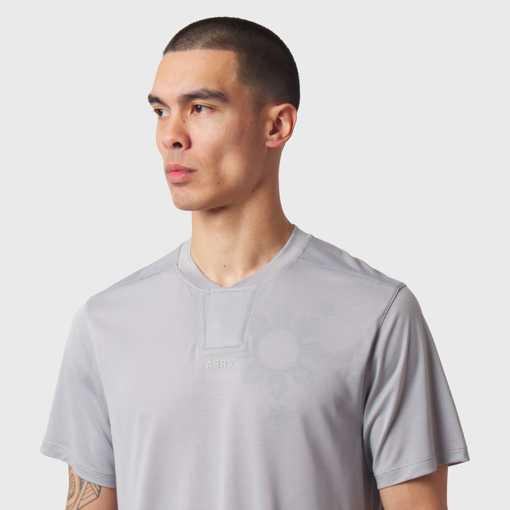 Polartec® Delta Polo in slate grey worn by male model, front view