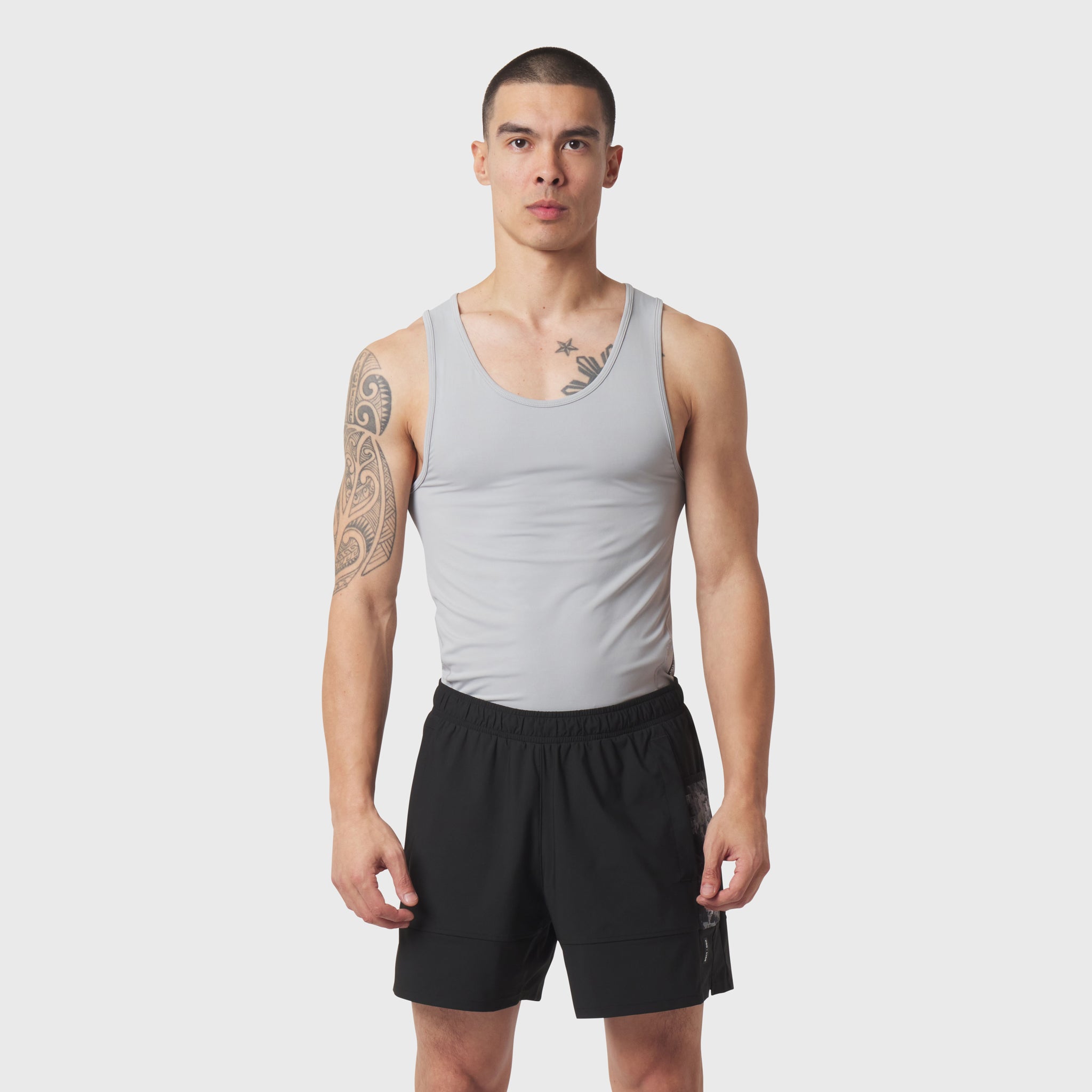 LYCRA® ADAPTIV Baselayer Tank in slate grey worn by model, front view