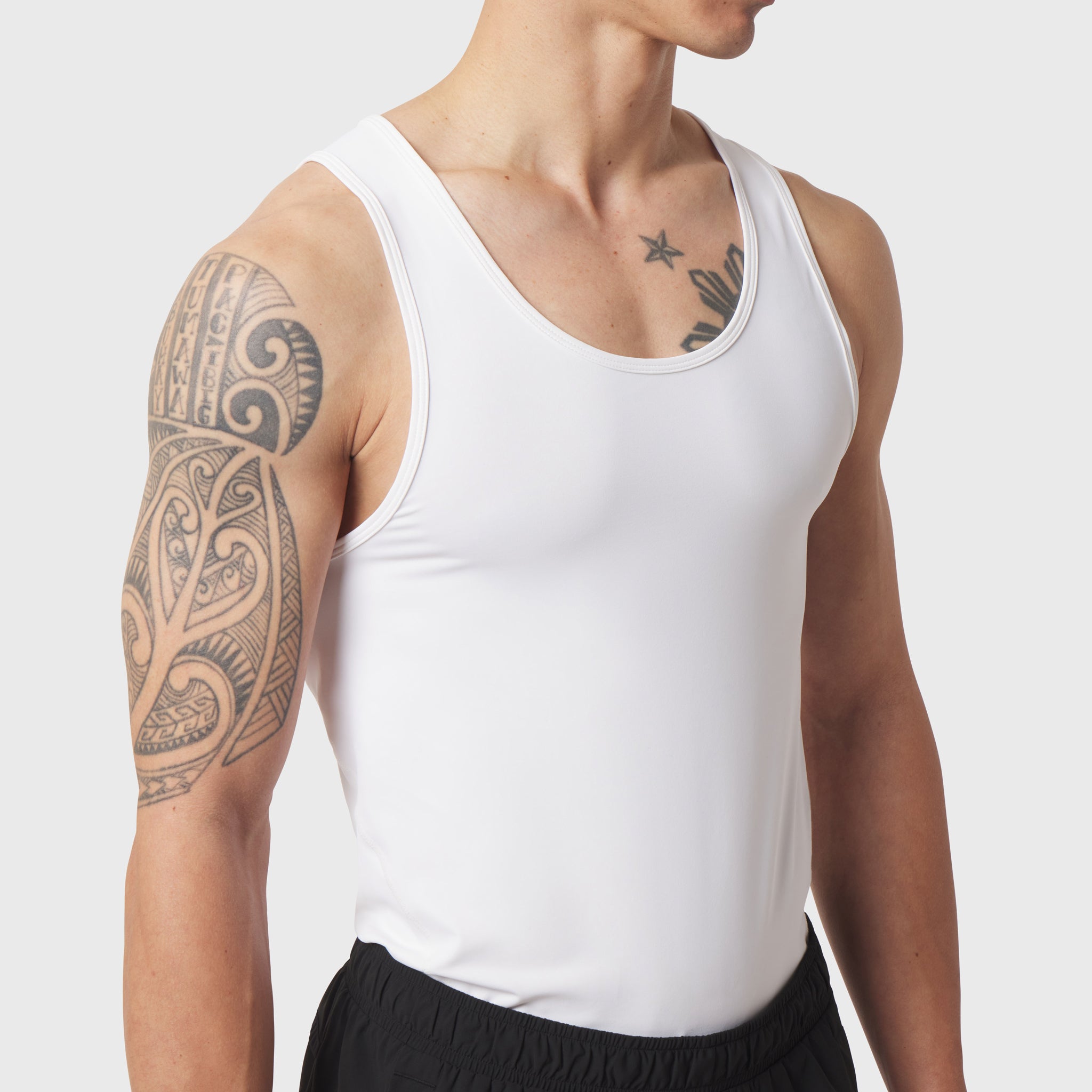 White LYCRA® ADAPTIV baselayer tank on model, front view
