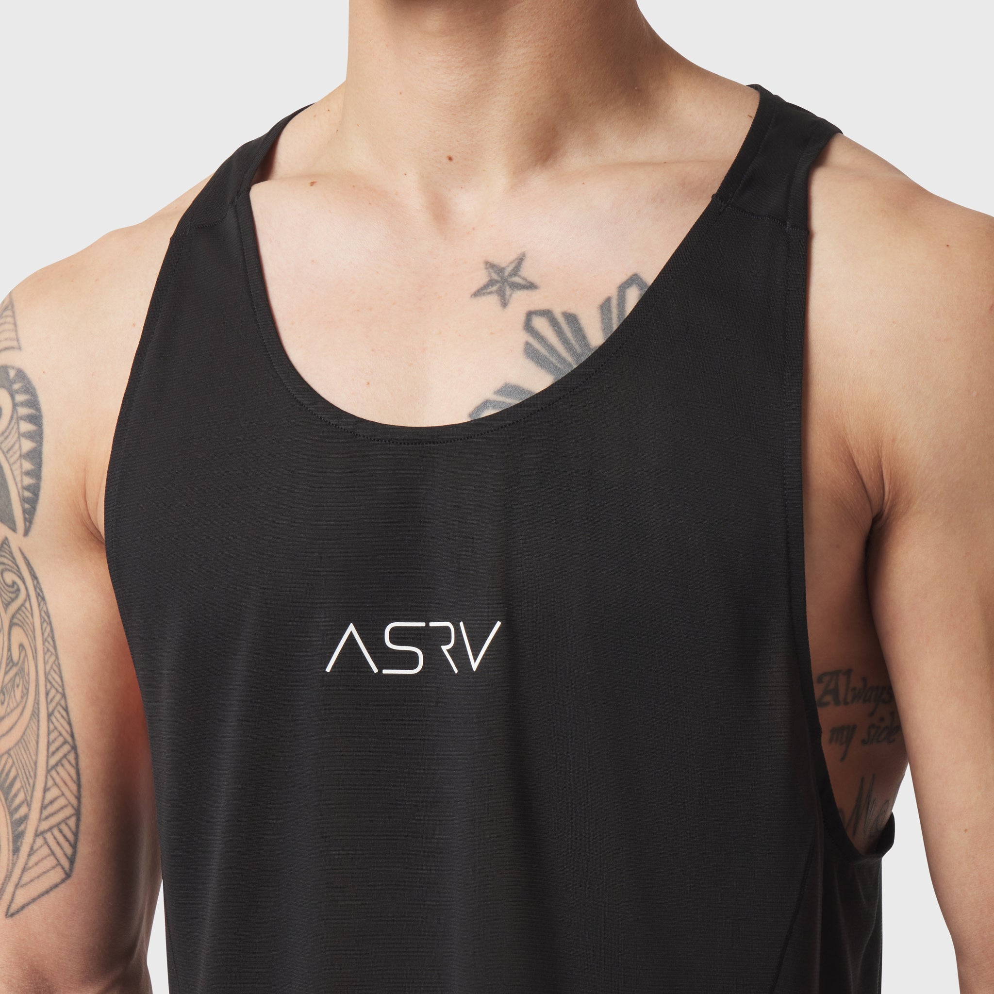 Black Polartec® Delta Singlet worn by male model, front view showing ASRV logo