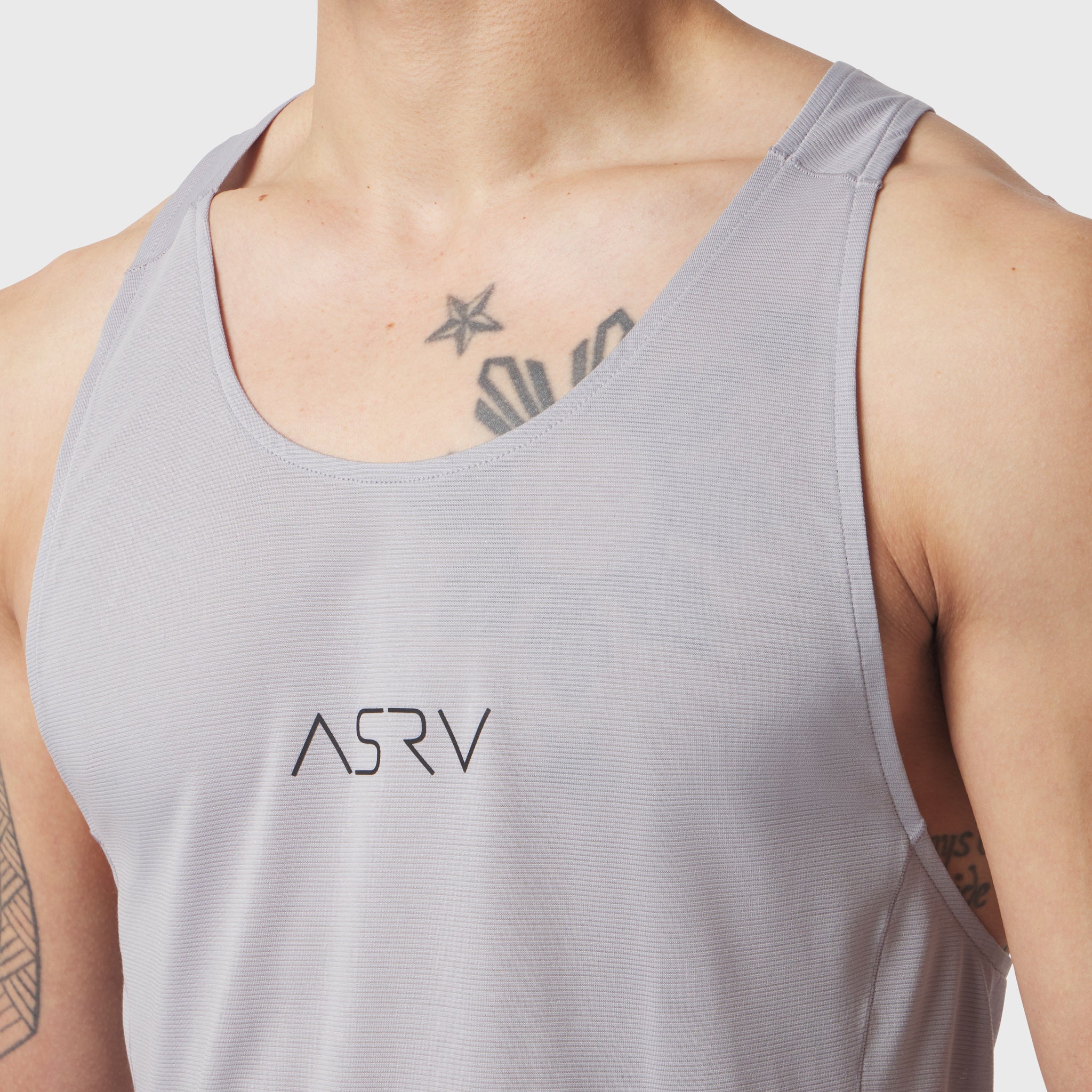 Polartec® Delta Singlet in slate grey worn by model, front view showing ASRV branding