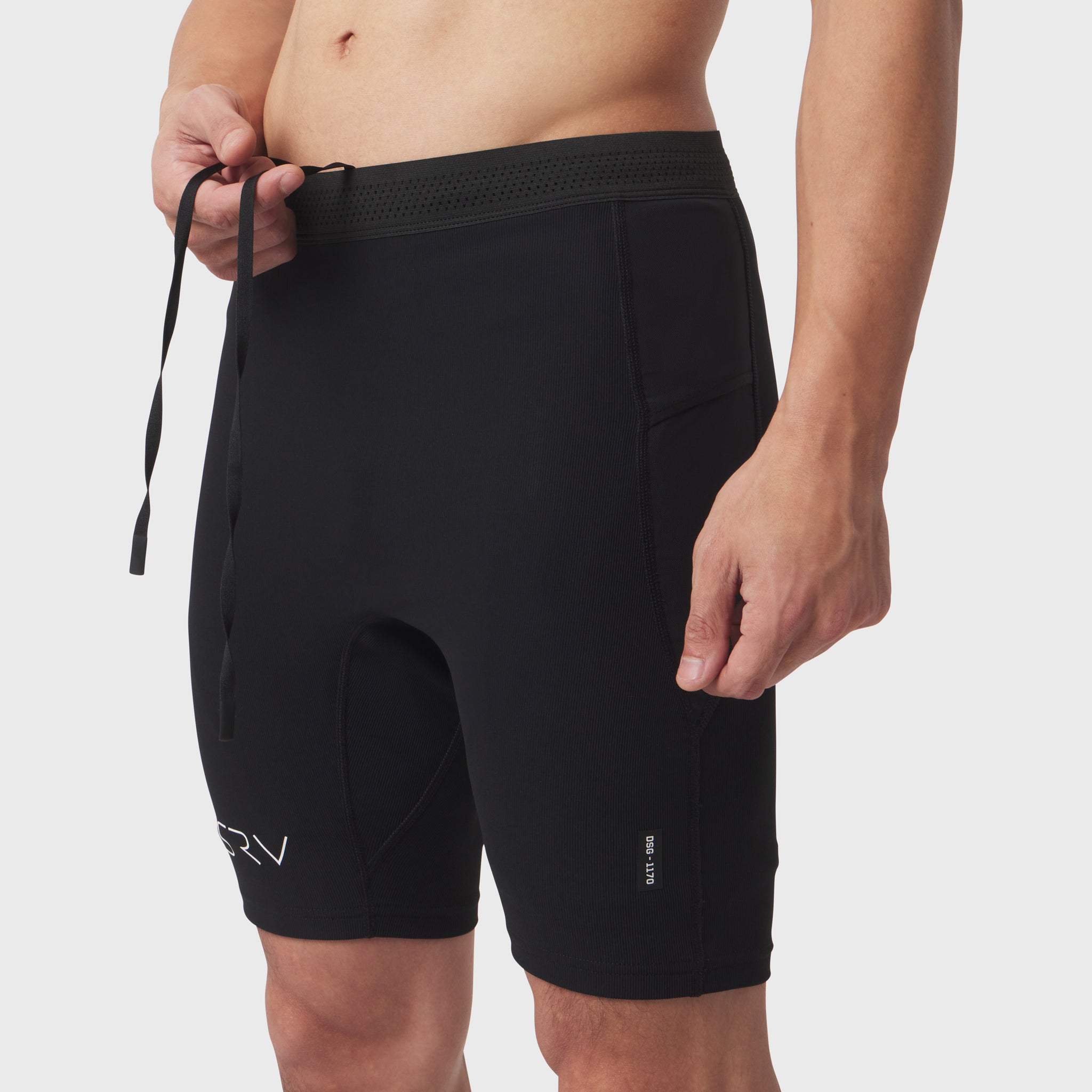 Black Lycra Ribbed Run Half-Tight shorts on model, front view with drawstring detail