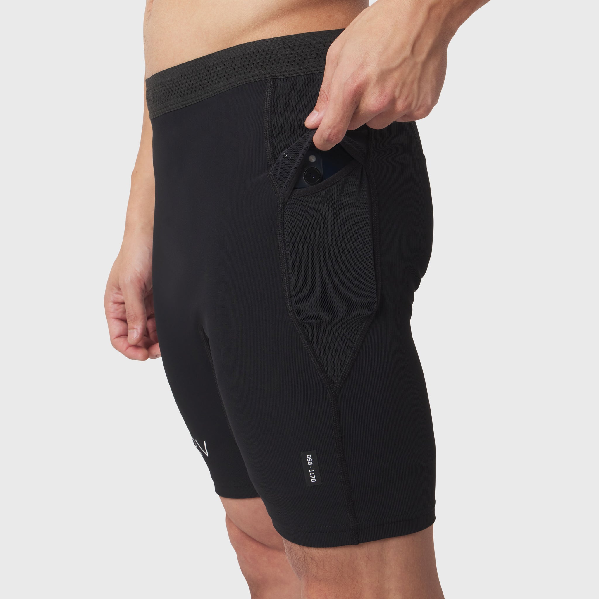 Lycra Ribbed Run Half-Tight shorts in black worn by model, side view