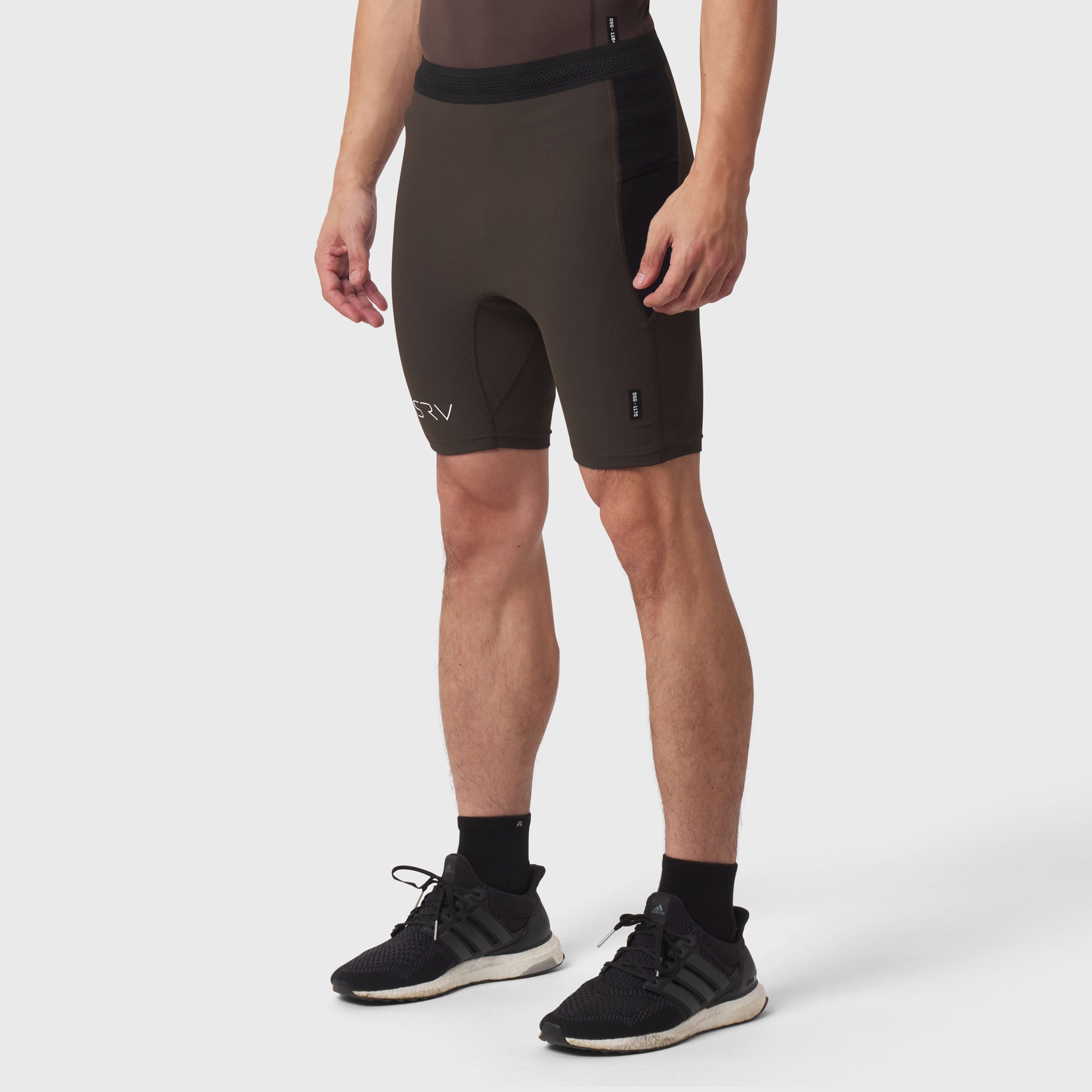 Lycra® Ribbed Run Half-Tight in dark earth, modeled from waist down