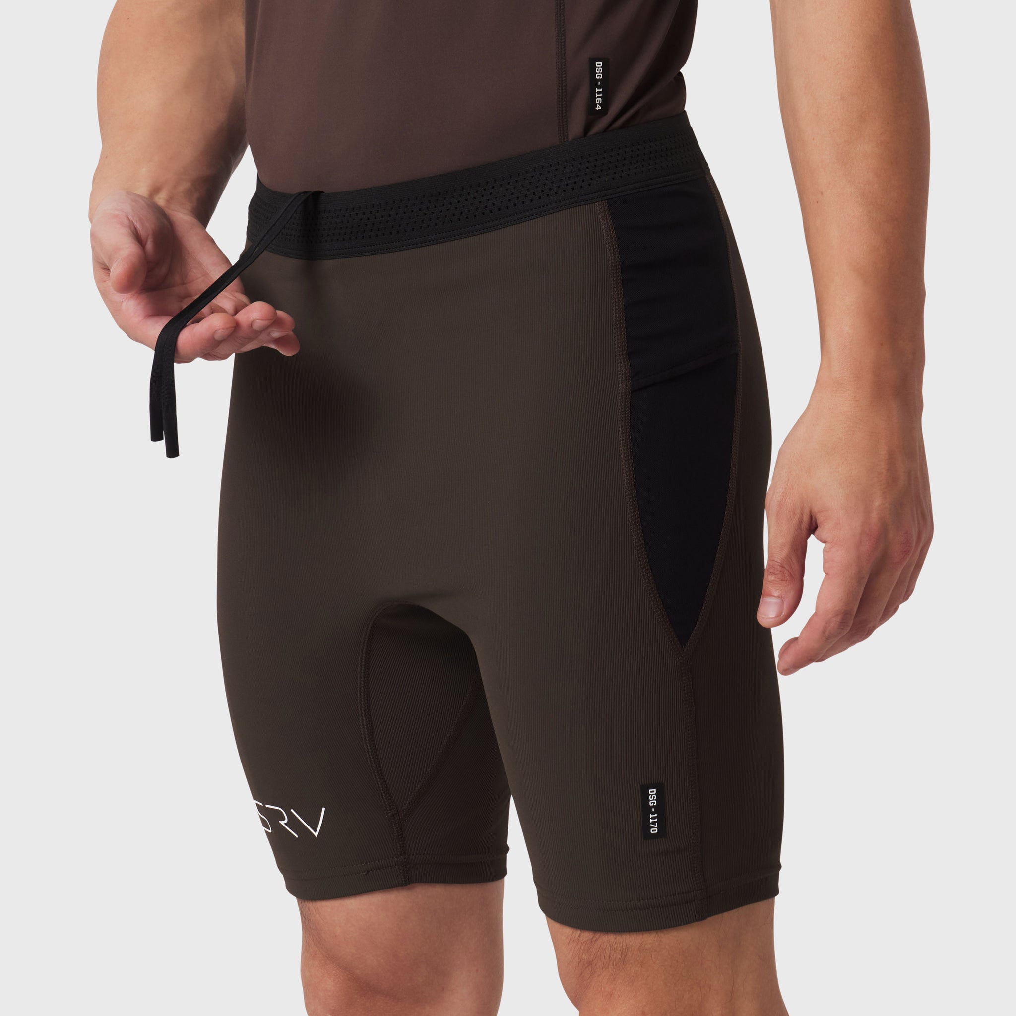 1170 Lycra® Ribbed Run Half-Tight in dark earth, worn by model, front side view