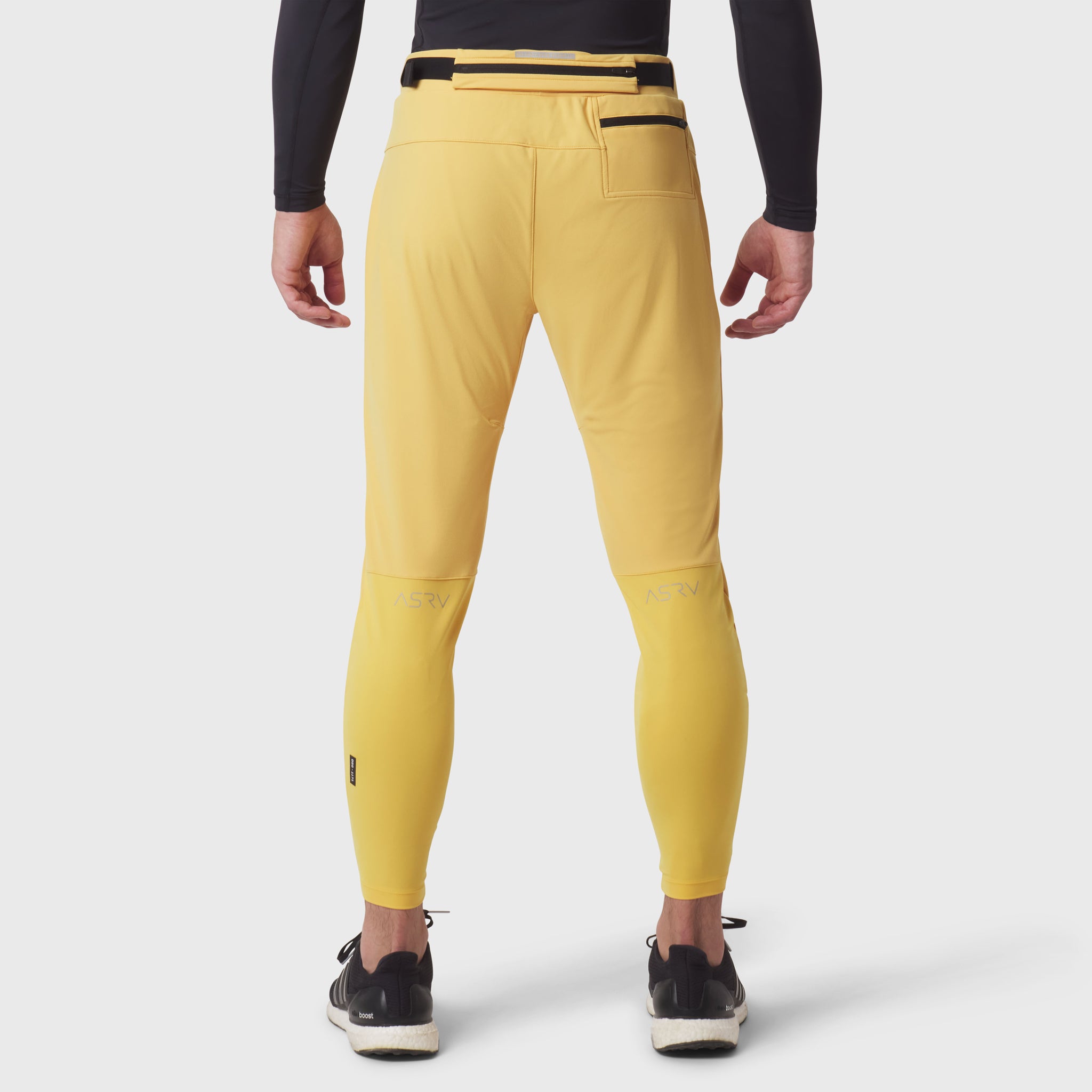 Amber hybrid belt-pack run jogger worn by model, back view