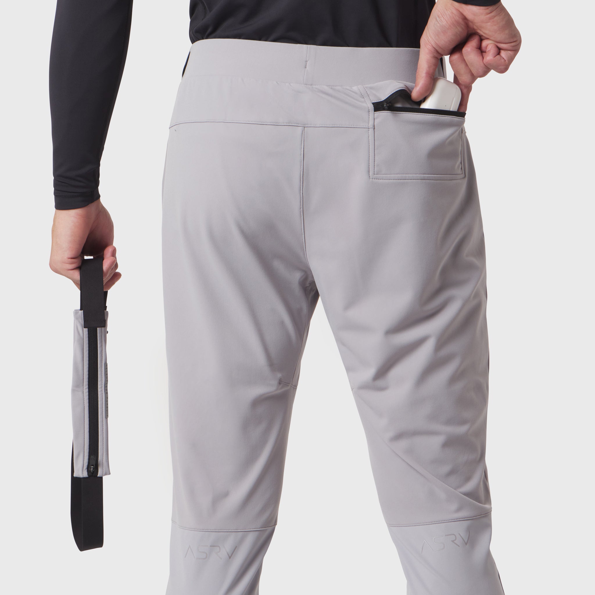 Hybrid Belt-Pack Run Jogger in slate grey worn by model, rear view with belt-pack detail