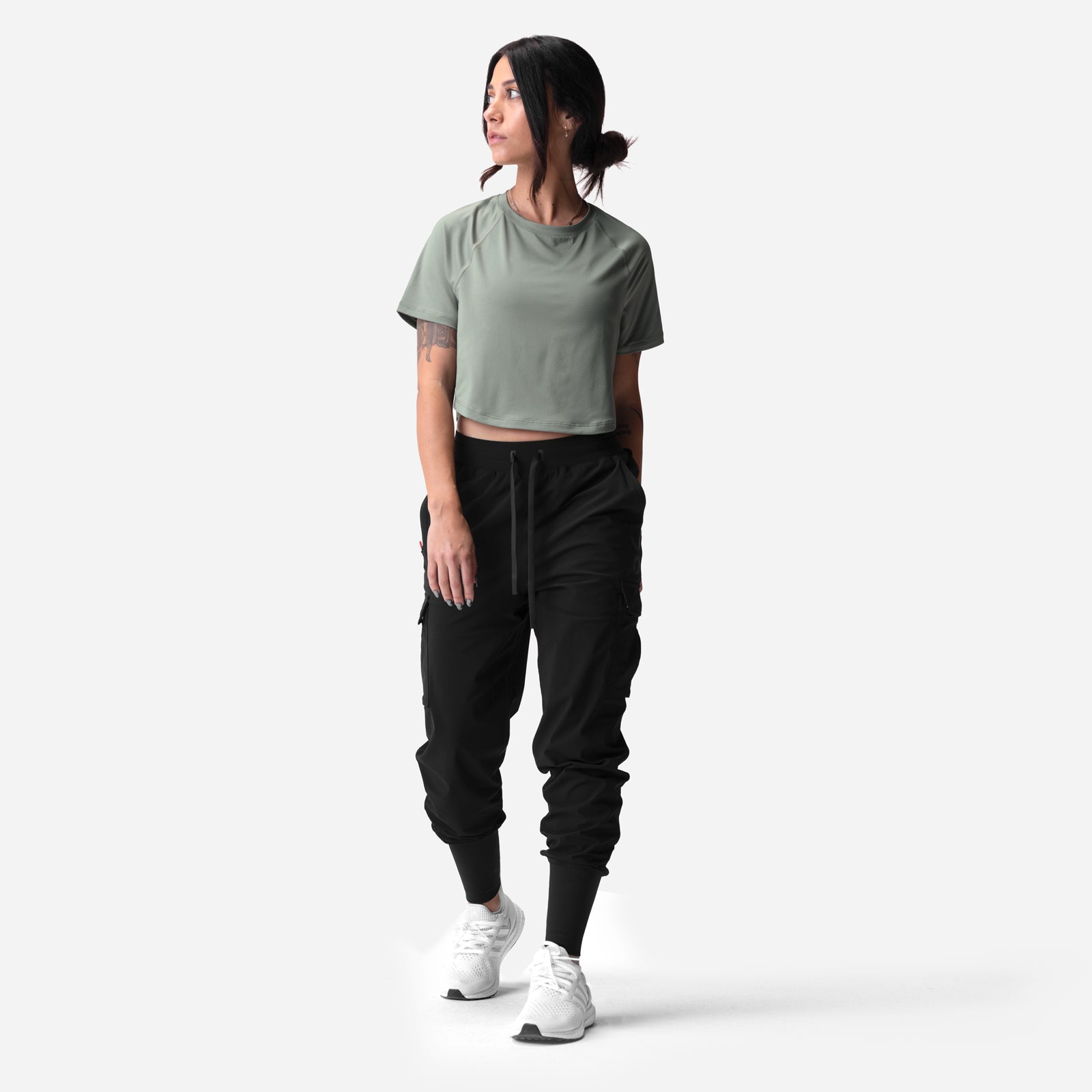 AeroSilver® Cropped Training Tee in sage worn with black cargo joggers, front view