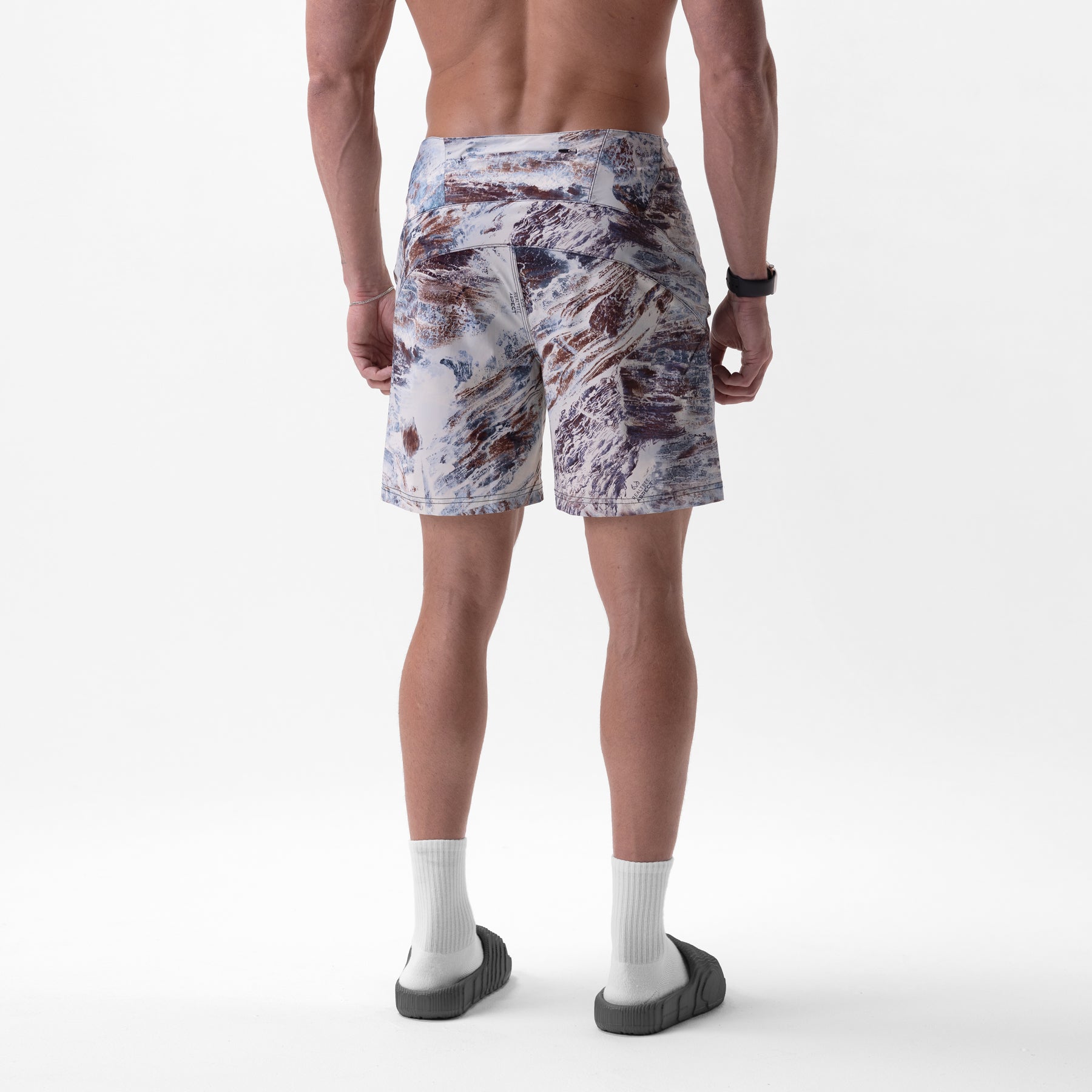 Revolutional Board Short in Realtree Aspect camo, back view on model