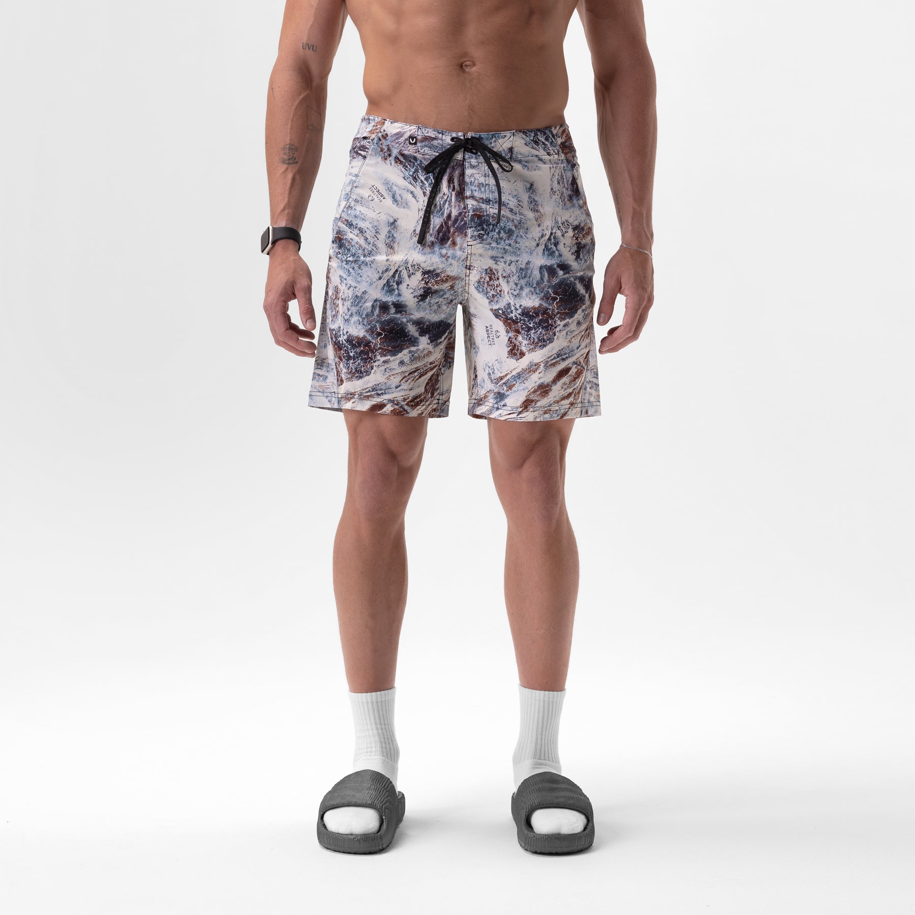 Revolutional Board Short in Realtree Aspect camo print, worn by model, front view