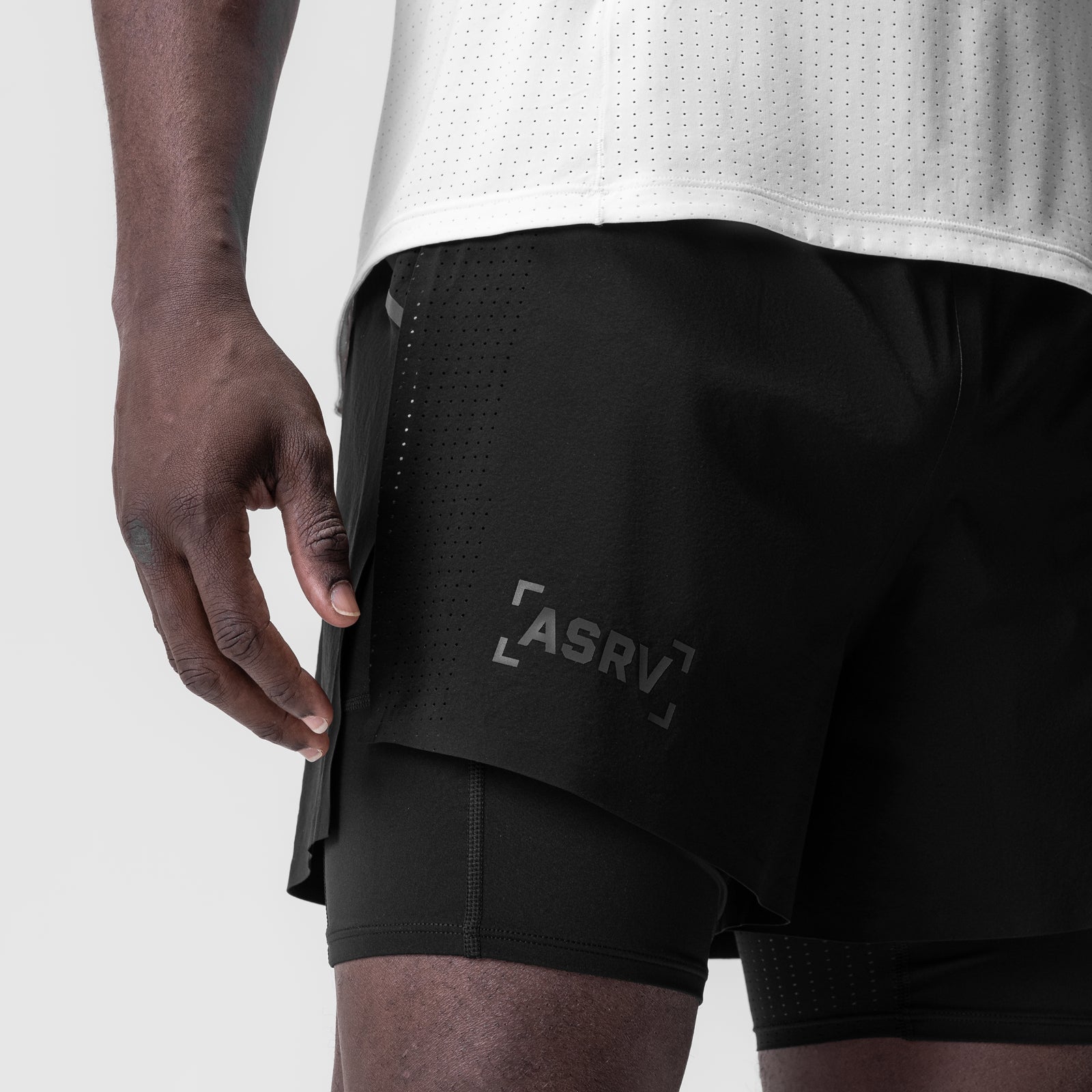 Aerotex 4" High Split Liner Short in black worn by model, side view
