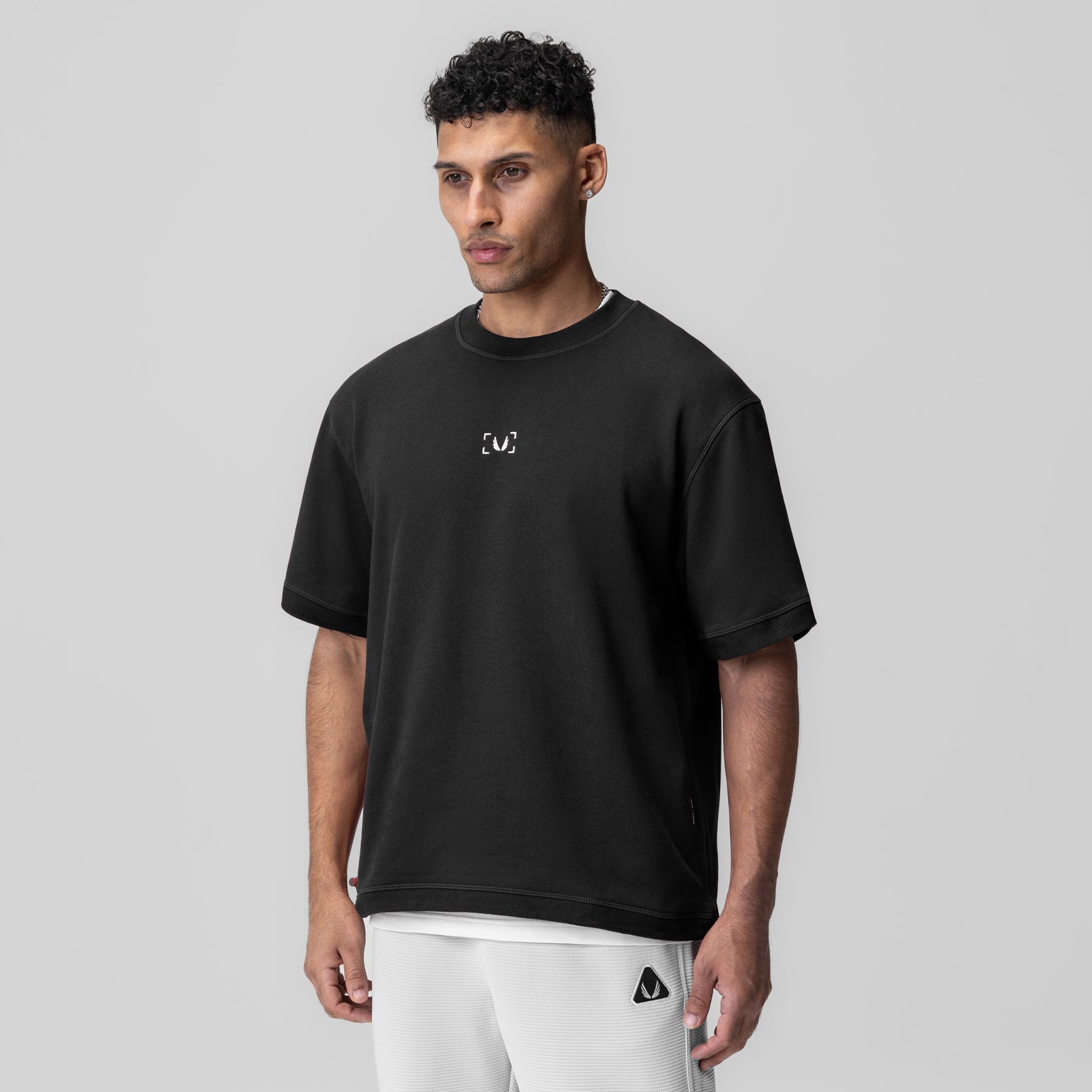 Herringbone Terry Oversized Cinch Tee in black, modeled front view