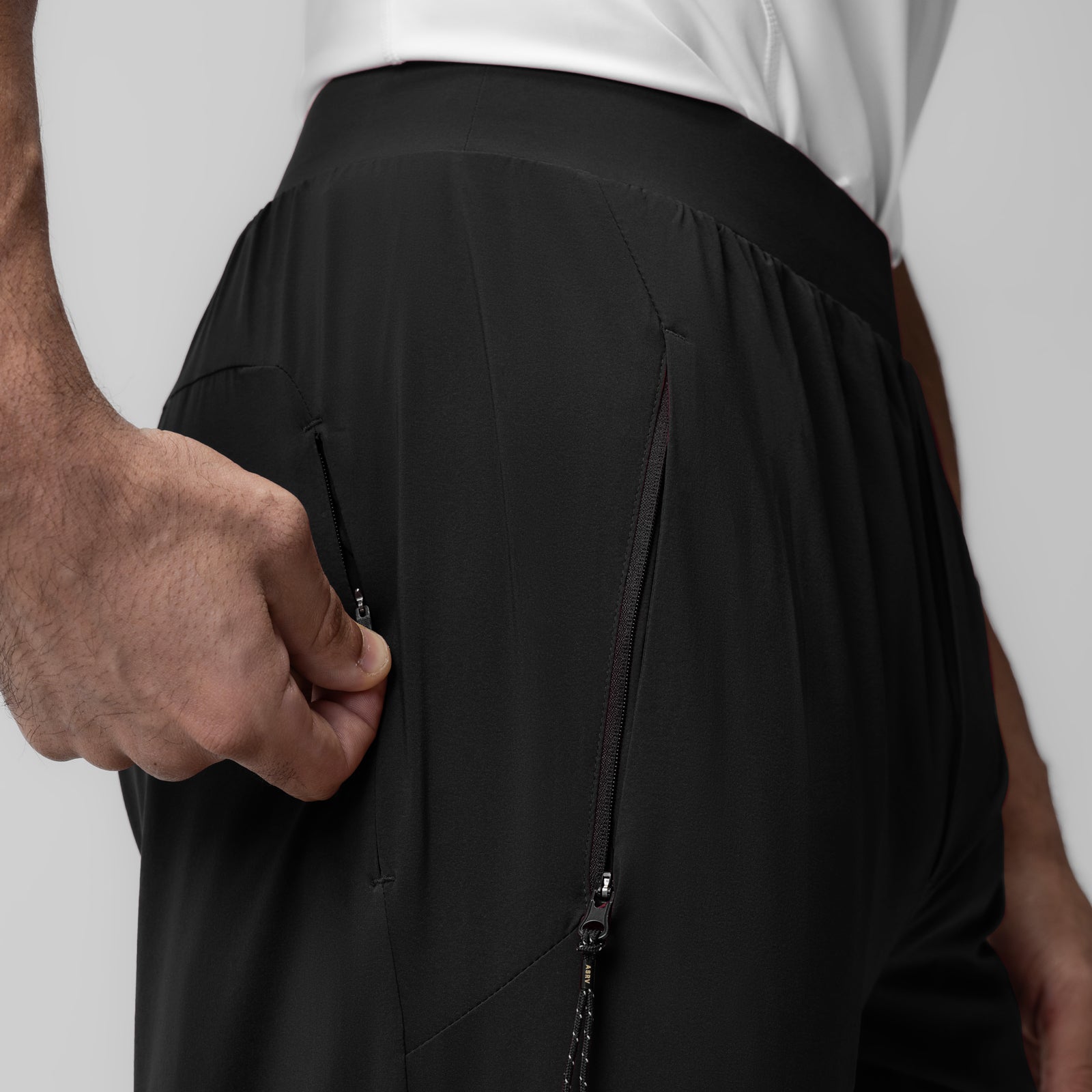 Aerotex Weather-Ready Bonded Pant in black, side detail with hand in pocket