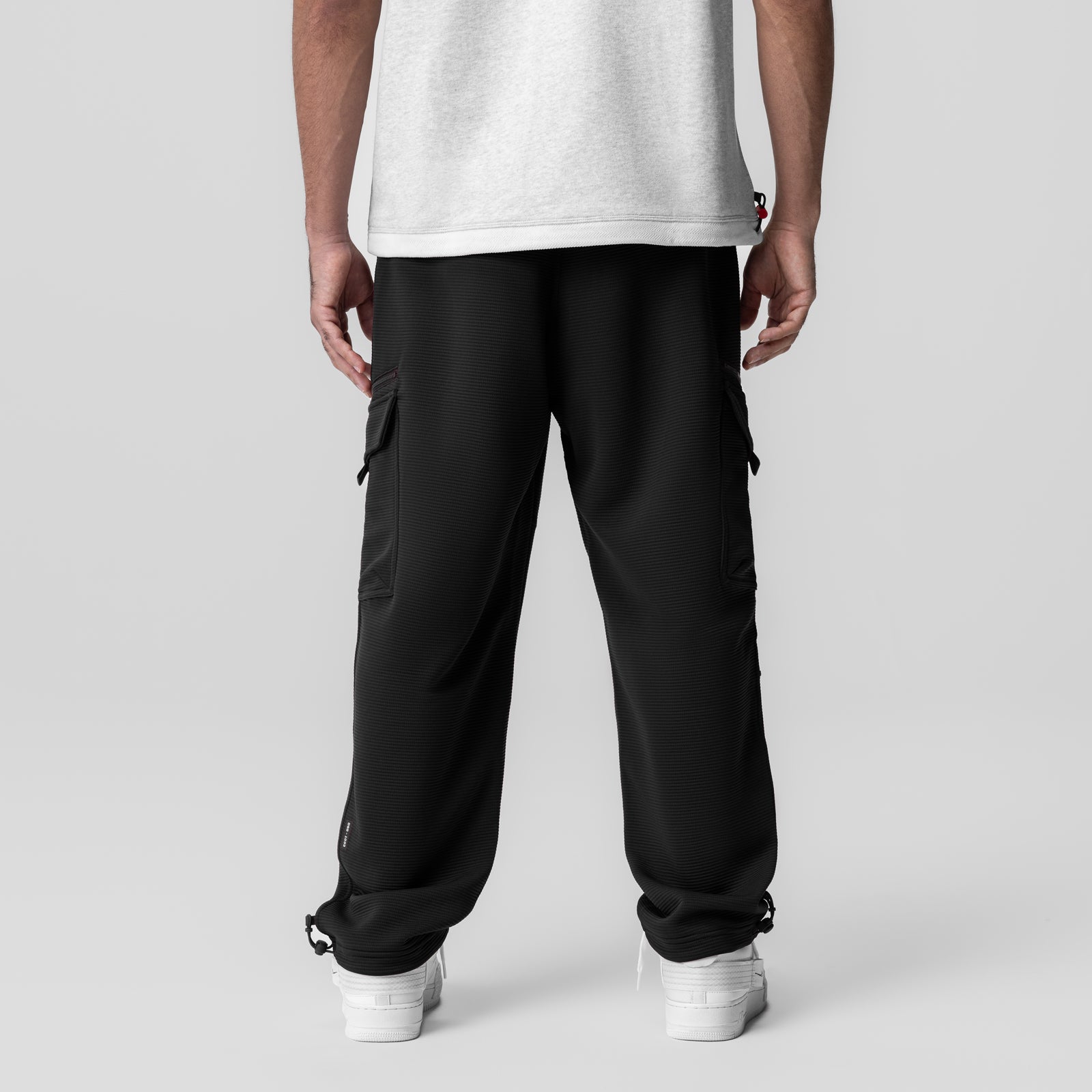 Black Deltapeak Cargo Cinch Jogger worn by model, back view