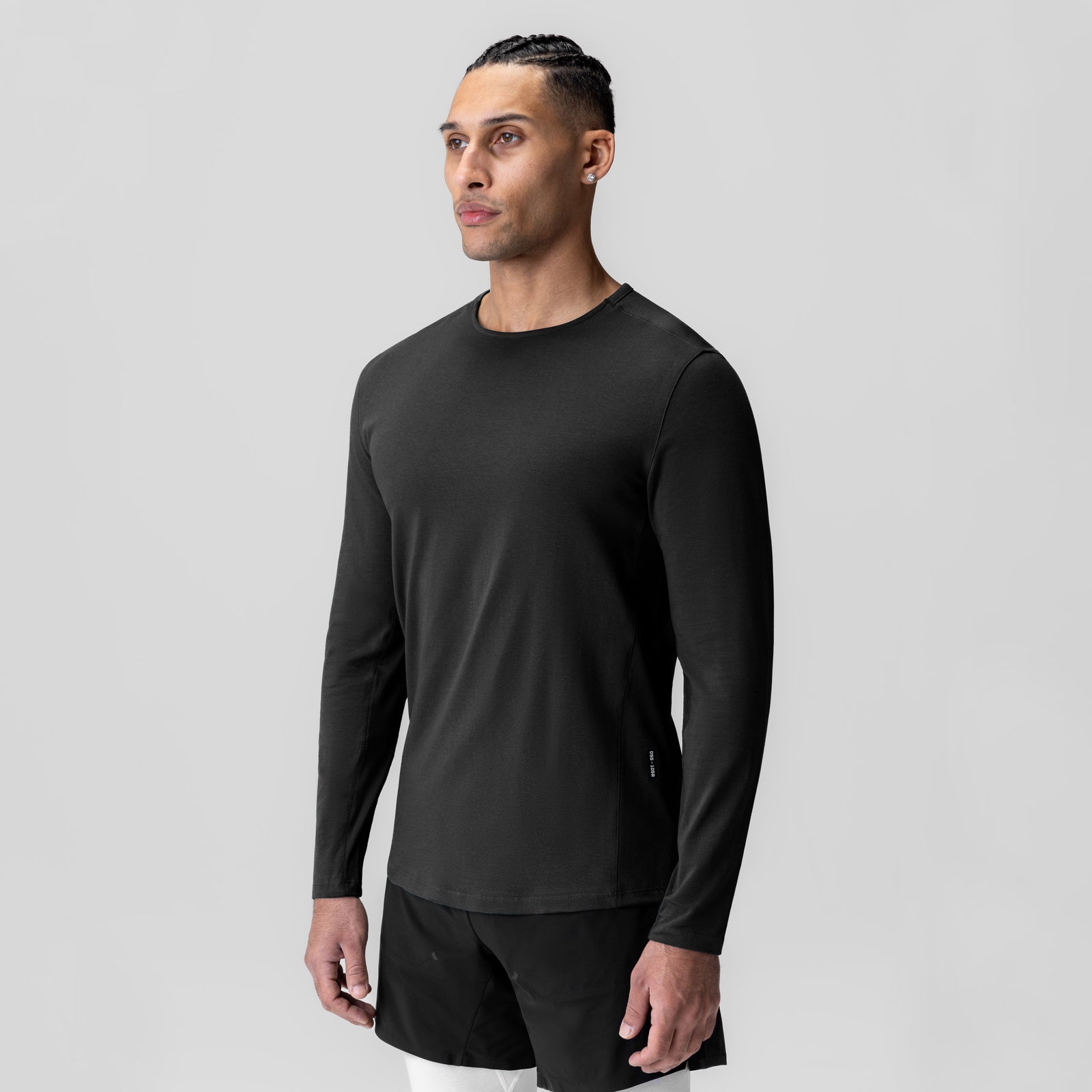 Black Creora® Cotton Modal Long Sleeve worn by model, front three-quarter view