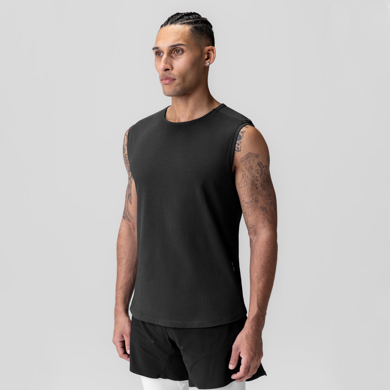 Black Creora® Cotton Modal Cutoff Tank worn by model, front view