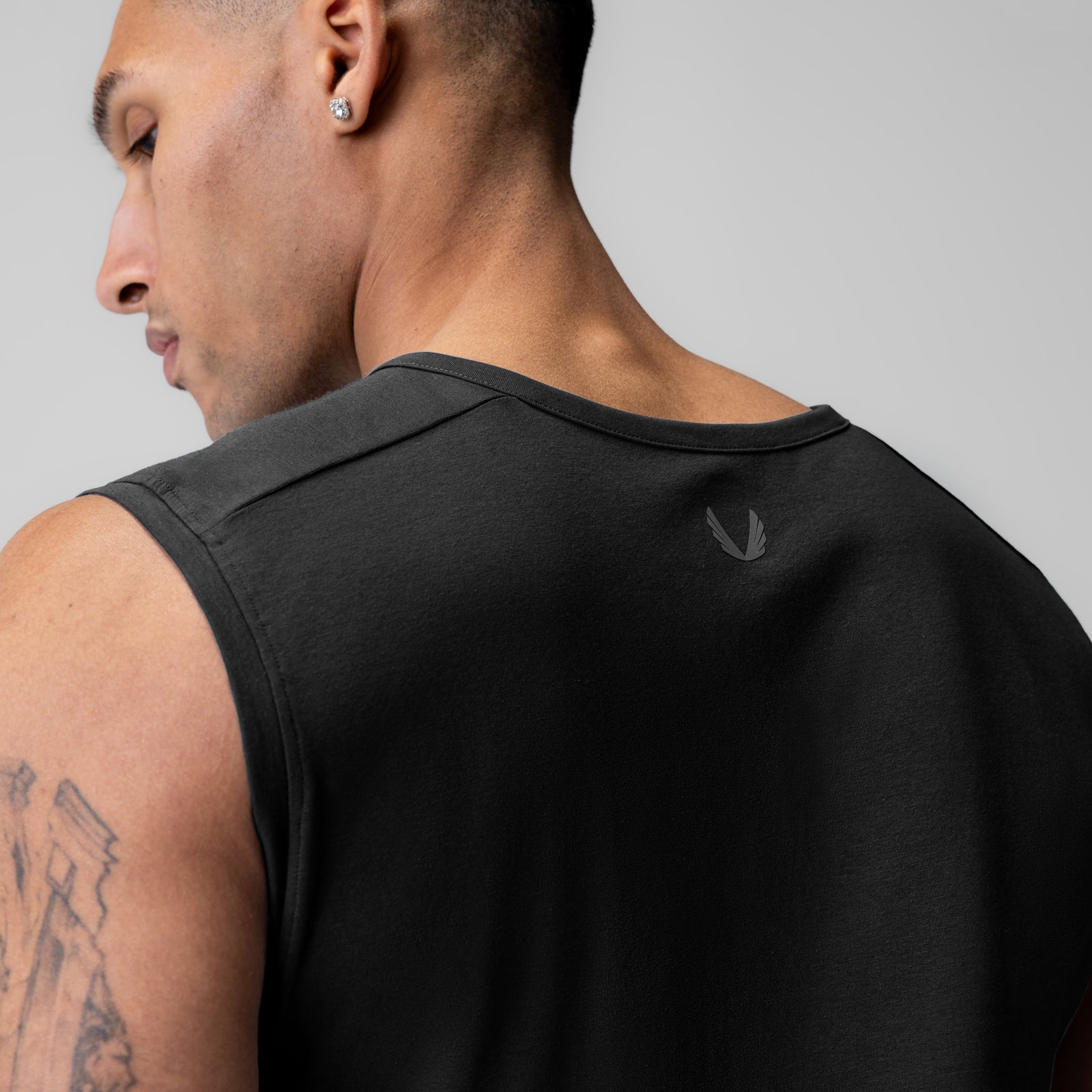 Black Creora® Cotton Modal Cutoff Tank worn by model, back view
