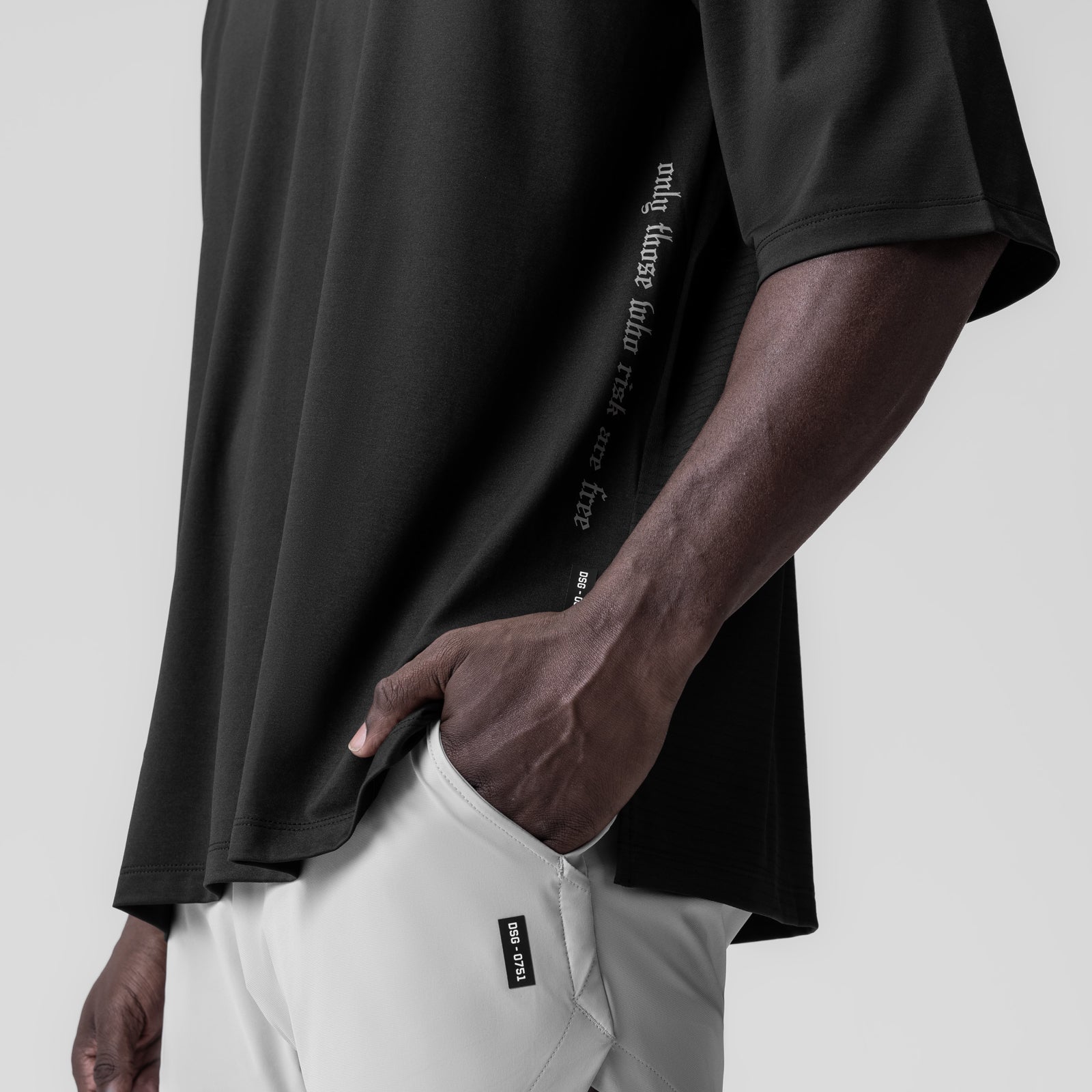 Black 3D-Lite oversized tee with 3/4 sleeves on model, side view