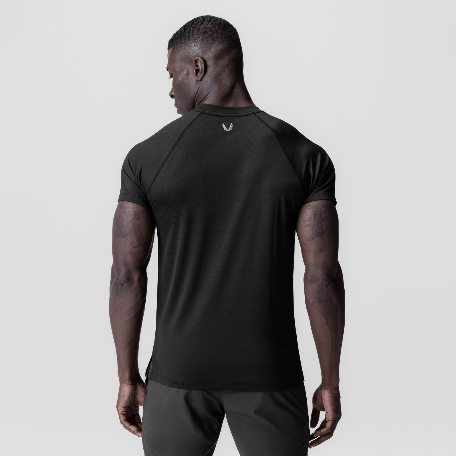 Black 3D-Lite® 2.0 Lycra® fitted tee worn by model, back view