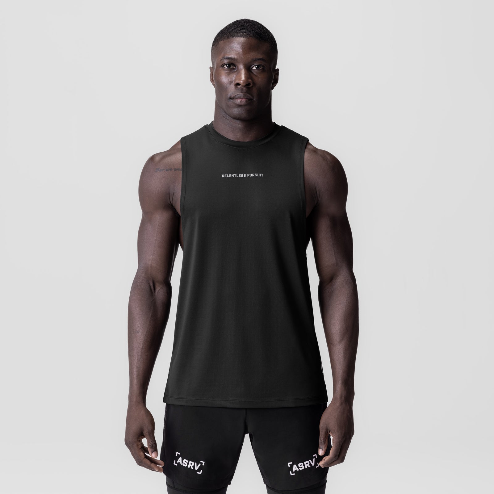 Black 3D-Lite® 2.0 Lycra® muscle tank worn by model, front view