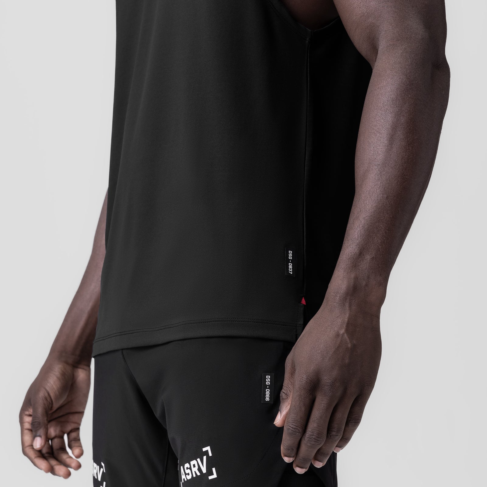 3D-Lite® 2.0 Lycra® Muscle Tank in black worn by model, side view