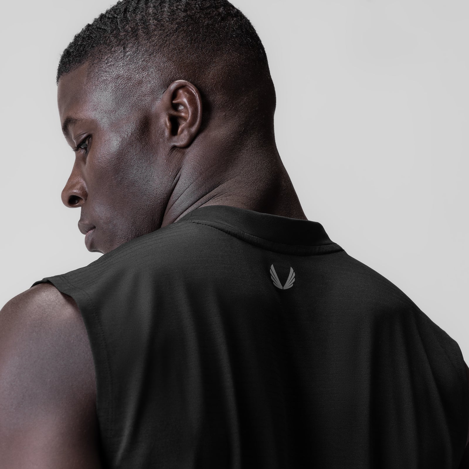 Black 3D-Lite® 2.0 Lycra® Relaxed Cutoff worn by model, side profile view