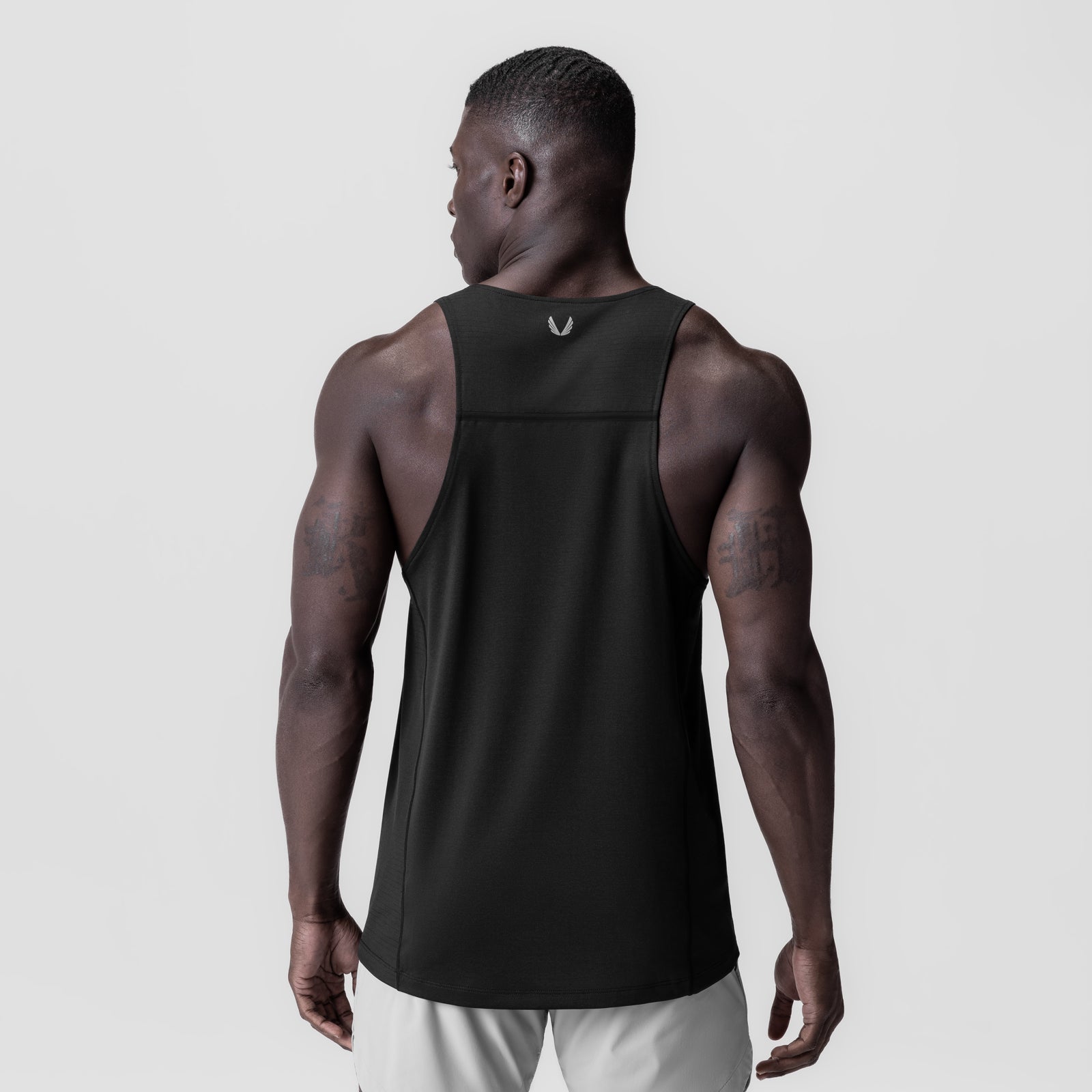 Black 3D-Lite® 2.0 Lycra® Pro Singlet worn by model, back view